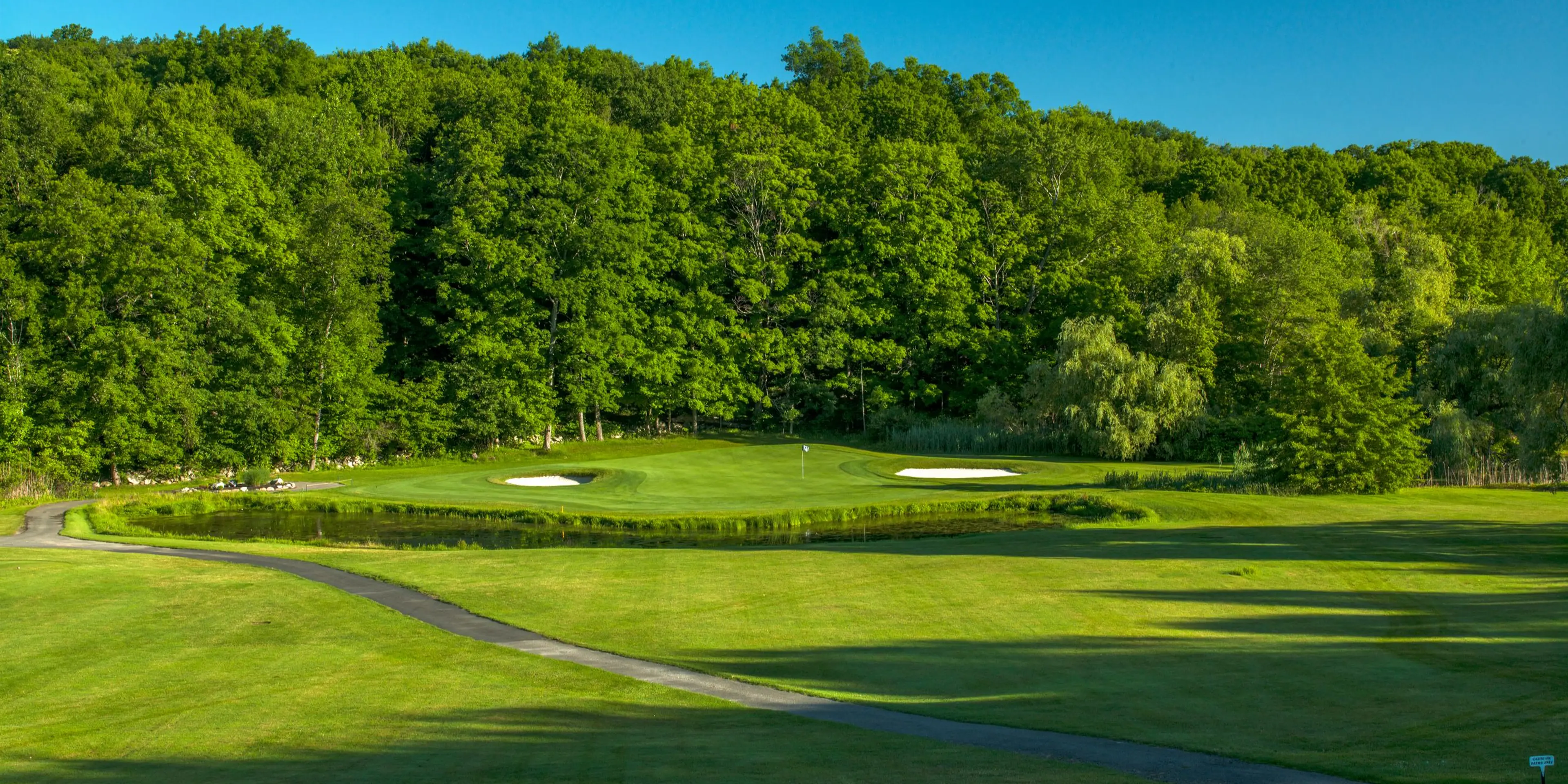 Landscape putting greens and fairway photo of the Putnam County Golf Course golf course