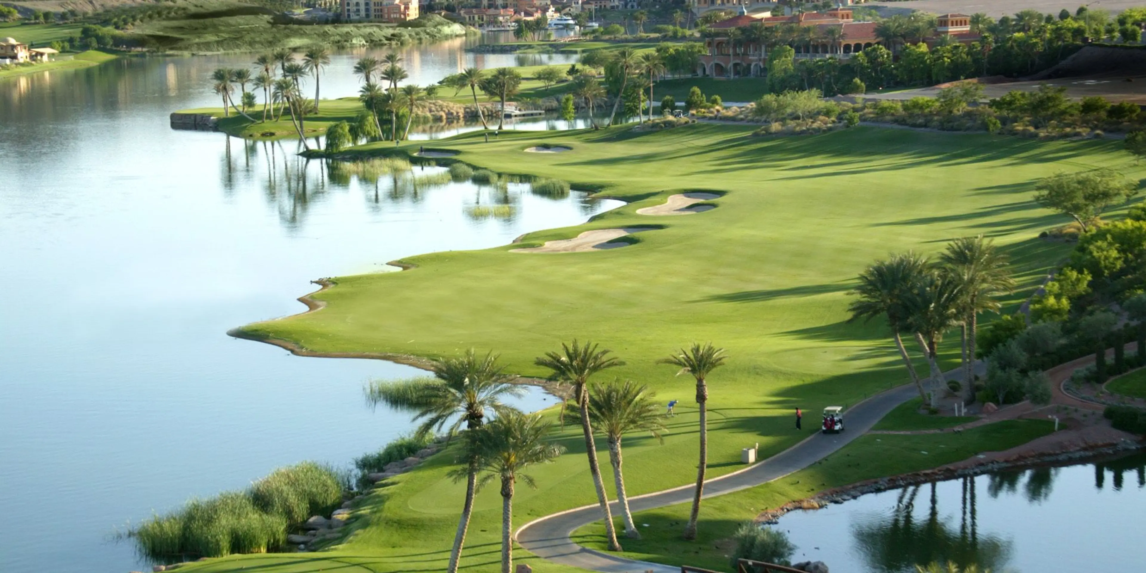 Landscape putting greens and fairway photo of the Reflection Bay Golf Club golf course