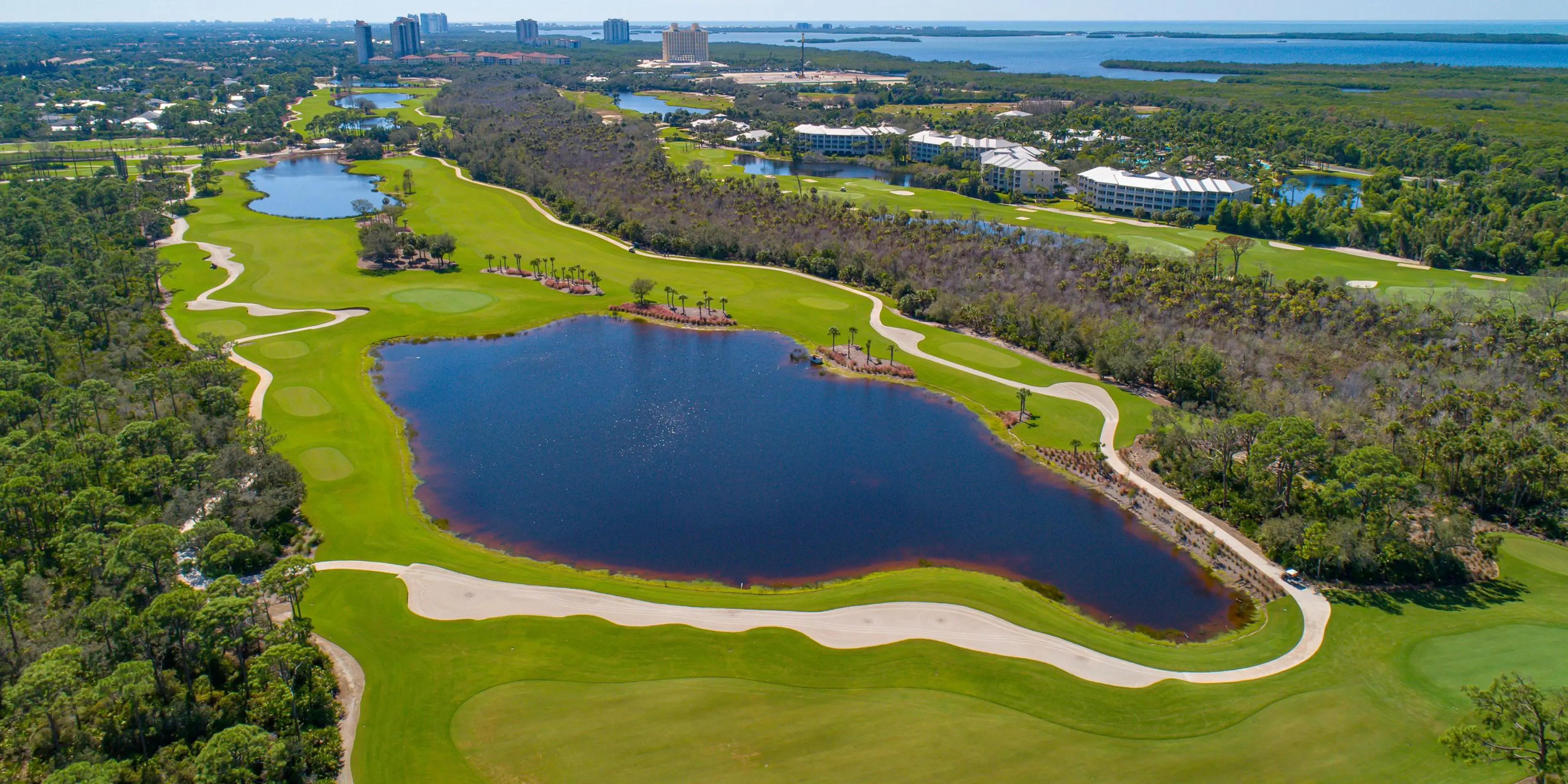 Landscape putting greens and fairway photo of the Saltleaf Golf Preserve golf course