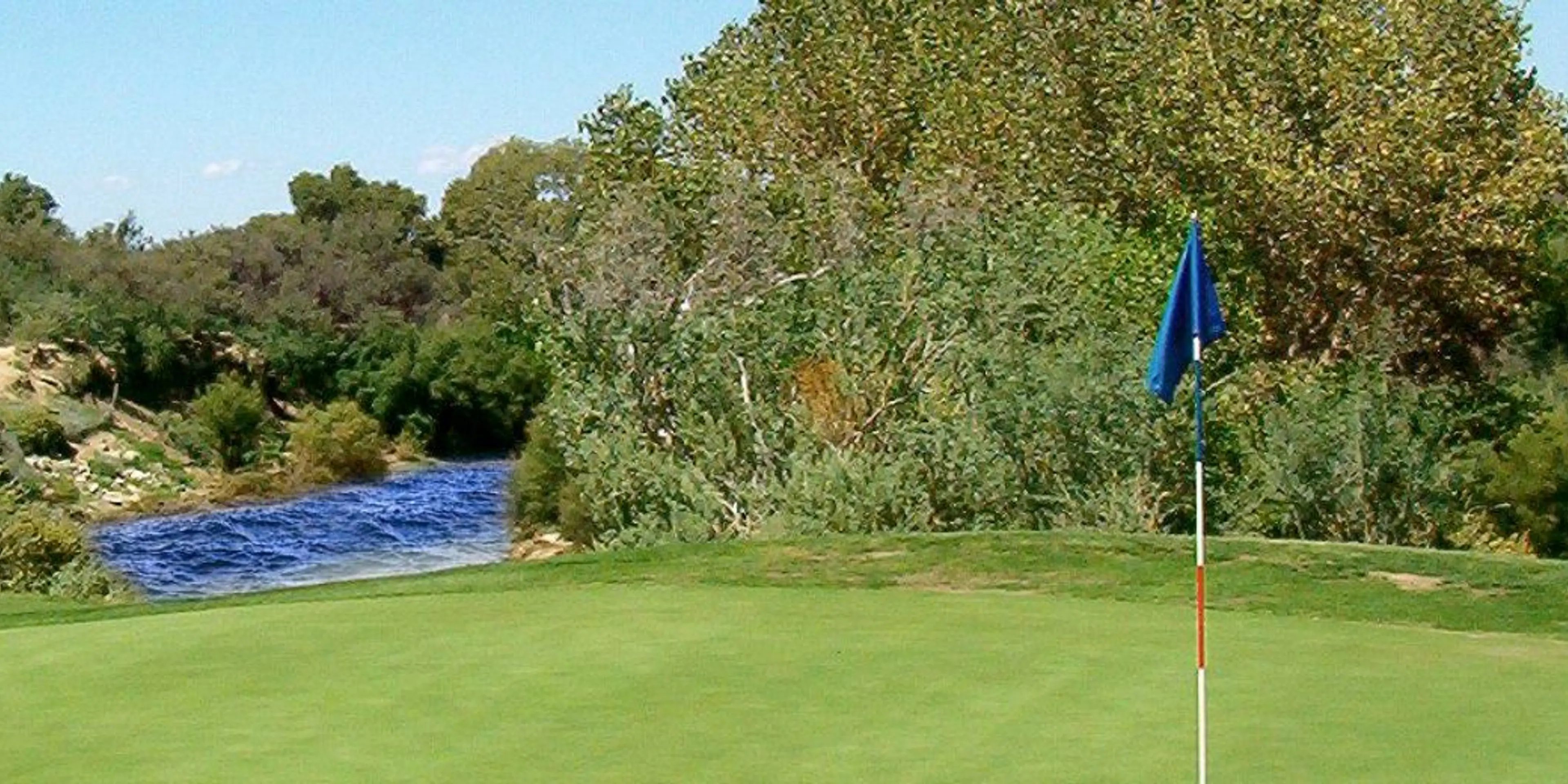 Landscape putting greens and fairway photo of the San Pedro Golf Course golf course