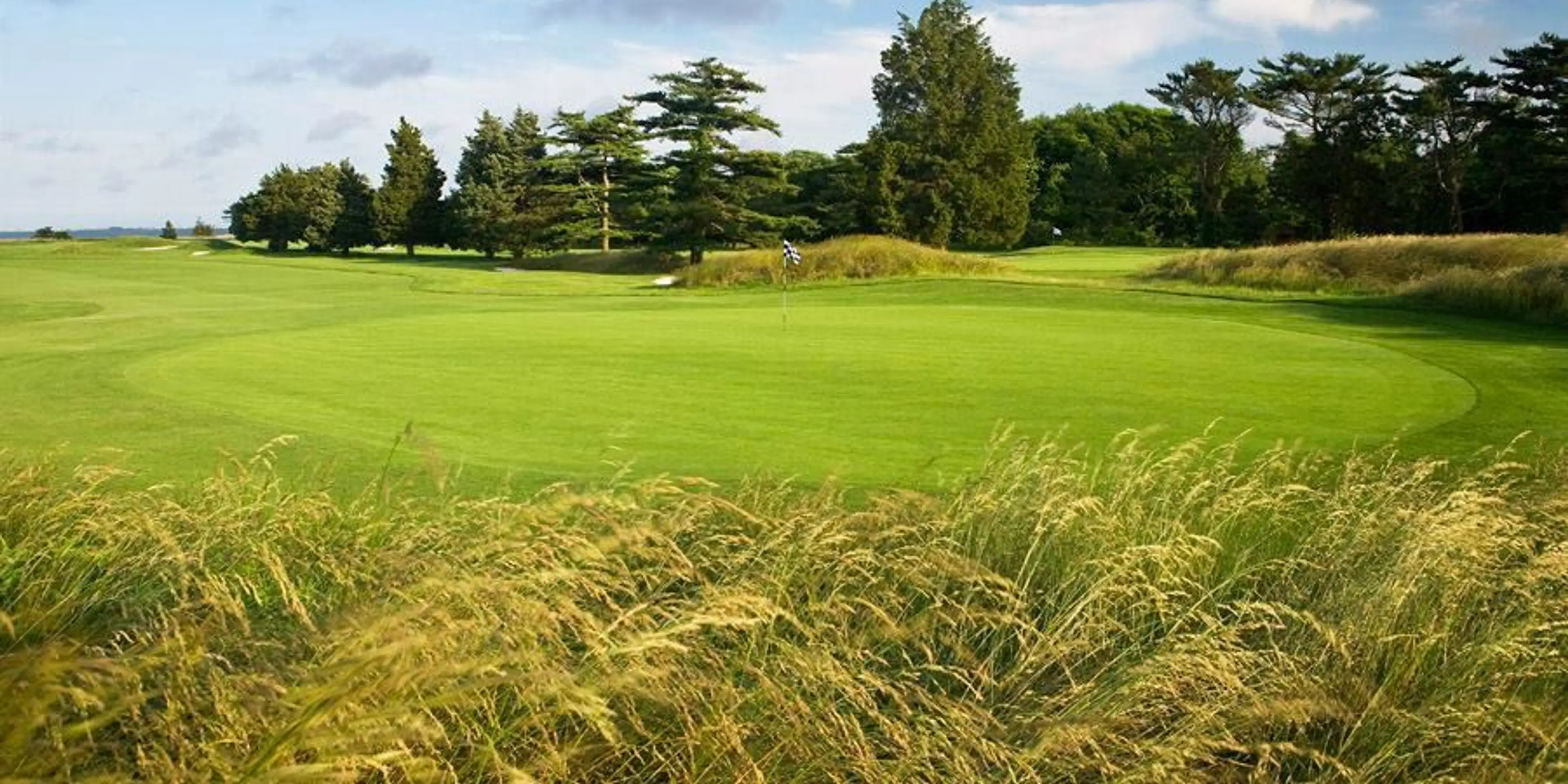 Landscape putting greens and fairway photo of the Seaview Hotel and Golf Club golf course