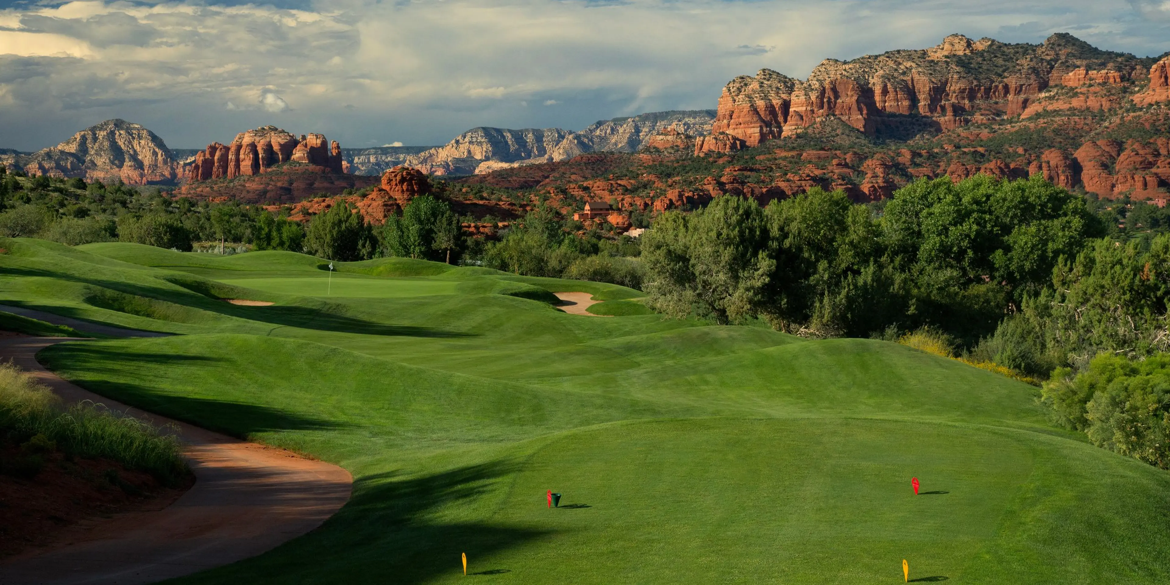 Landscape putting greens and fairway photo of the Sedona Golf Resort golf course