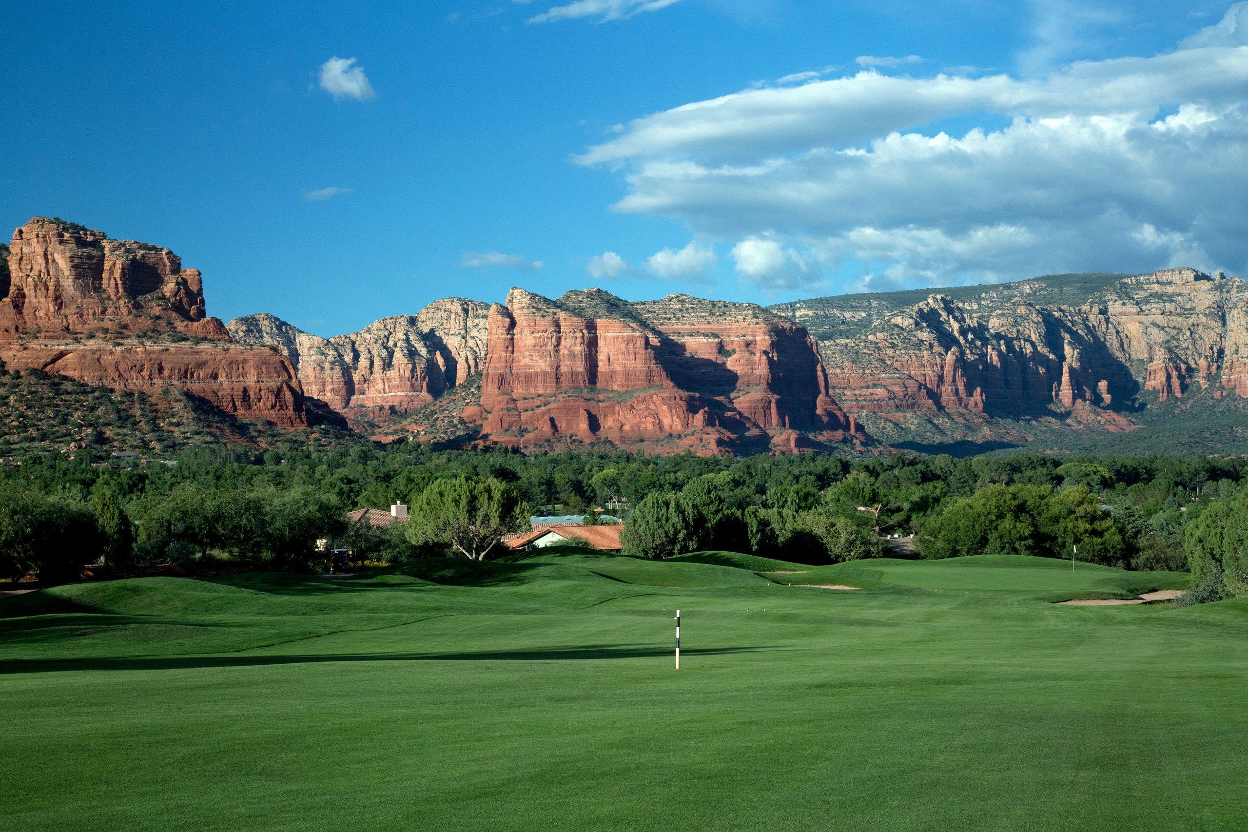 Landscape putting greens and fairway photo of the Sedona Golf Resort golf course