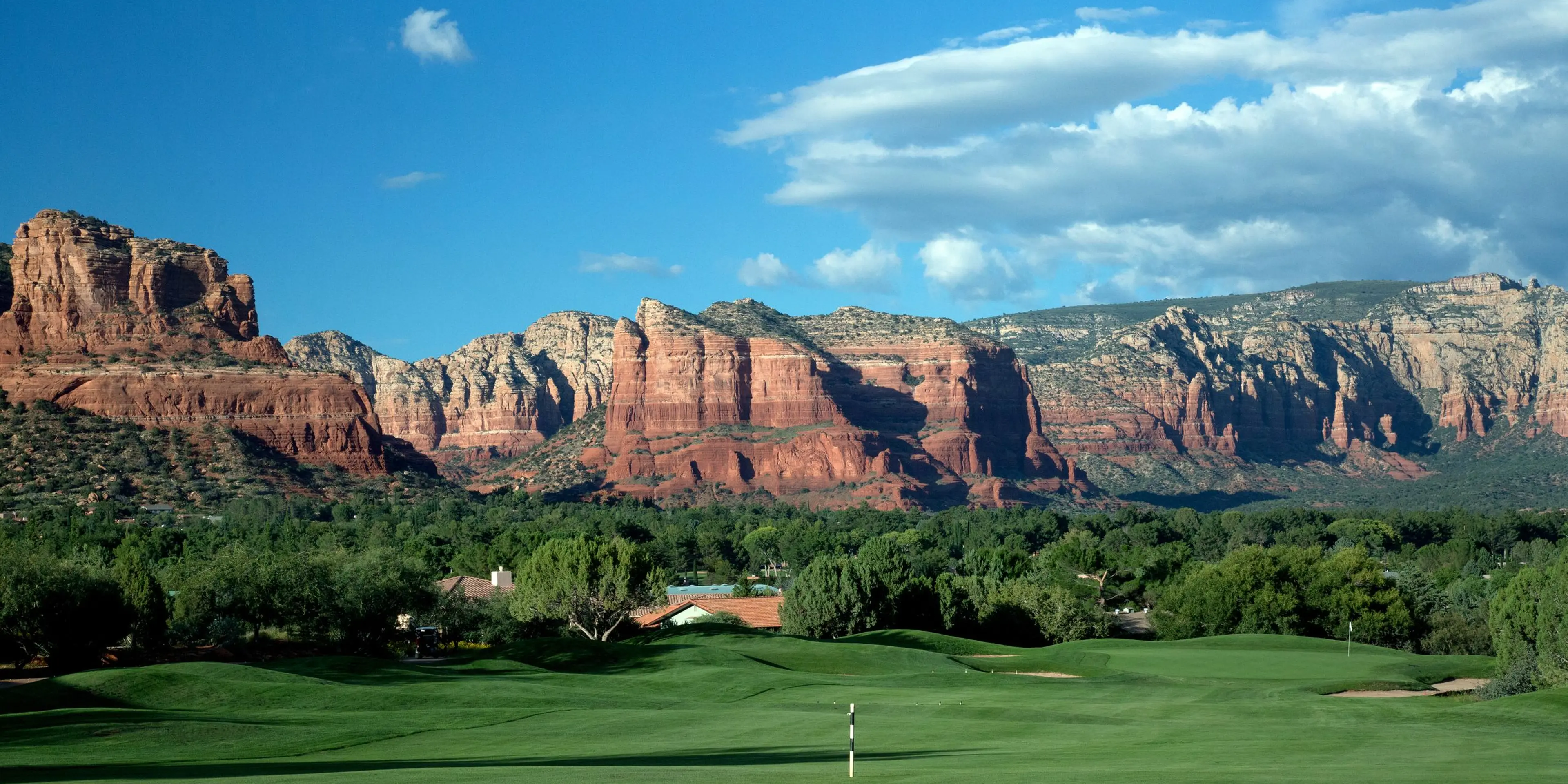 Landscape putting greens and fairway photo of the Sedona Golf Resort golf course