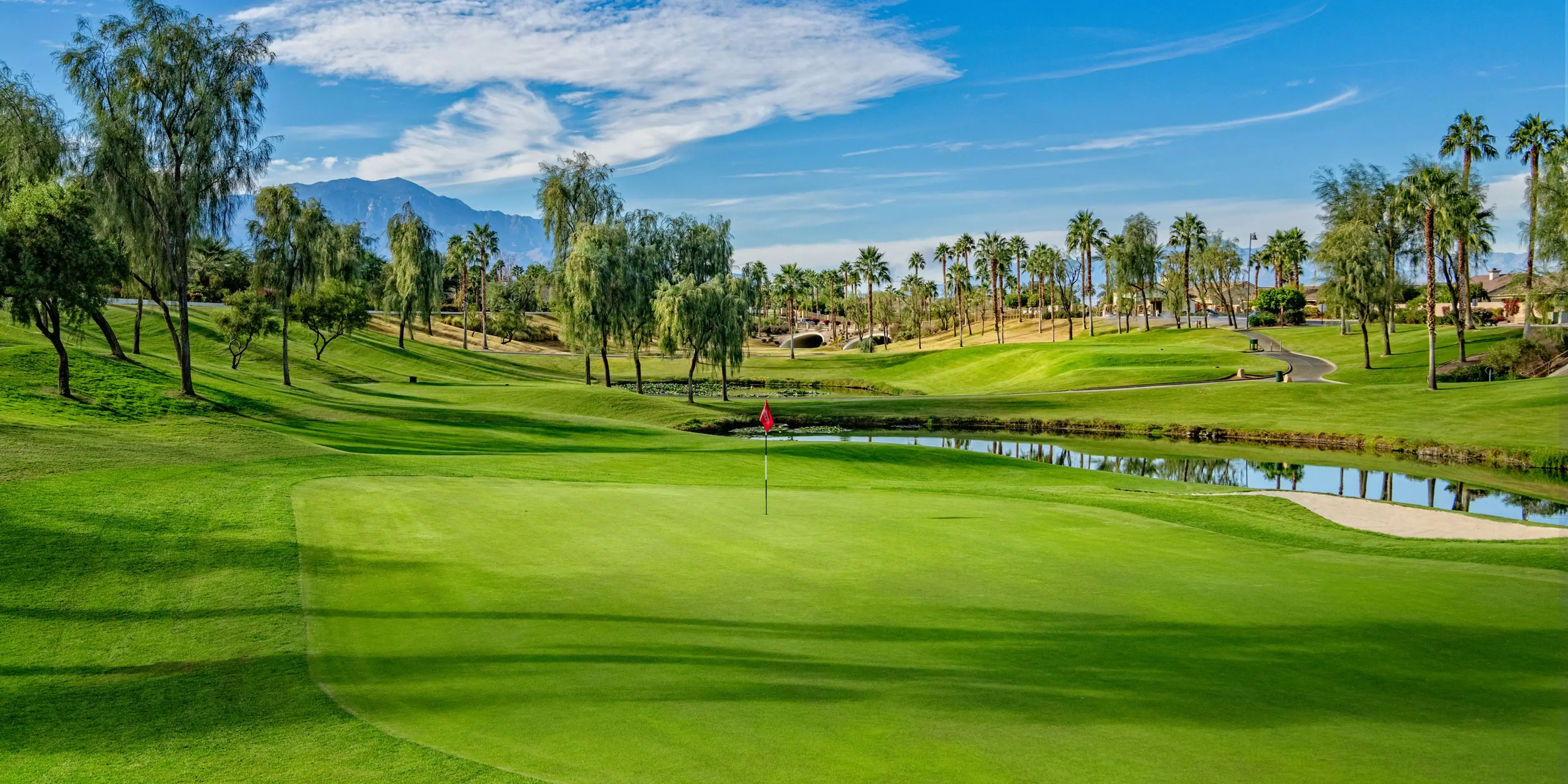 Landscape putting greens and fairway photo of the Shadow Hills Golf Club golf course