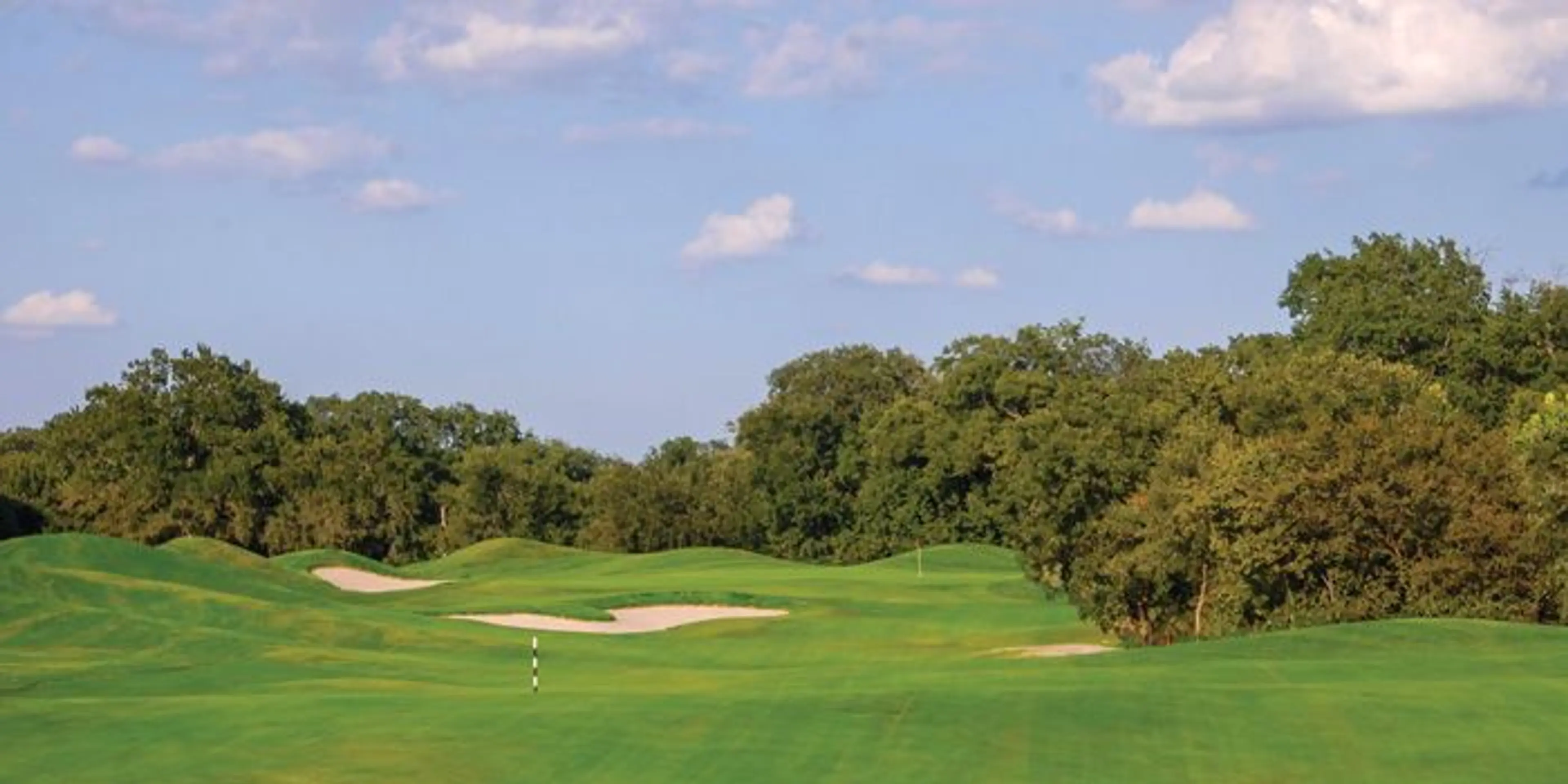 Landscape putting greens and fairway photo of the Split Rail Golf Club golf course