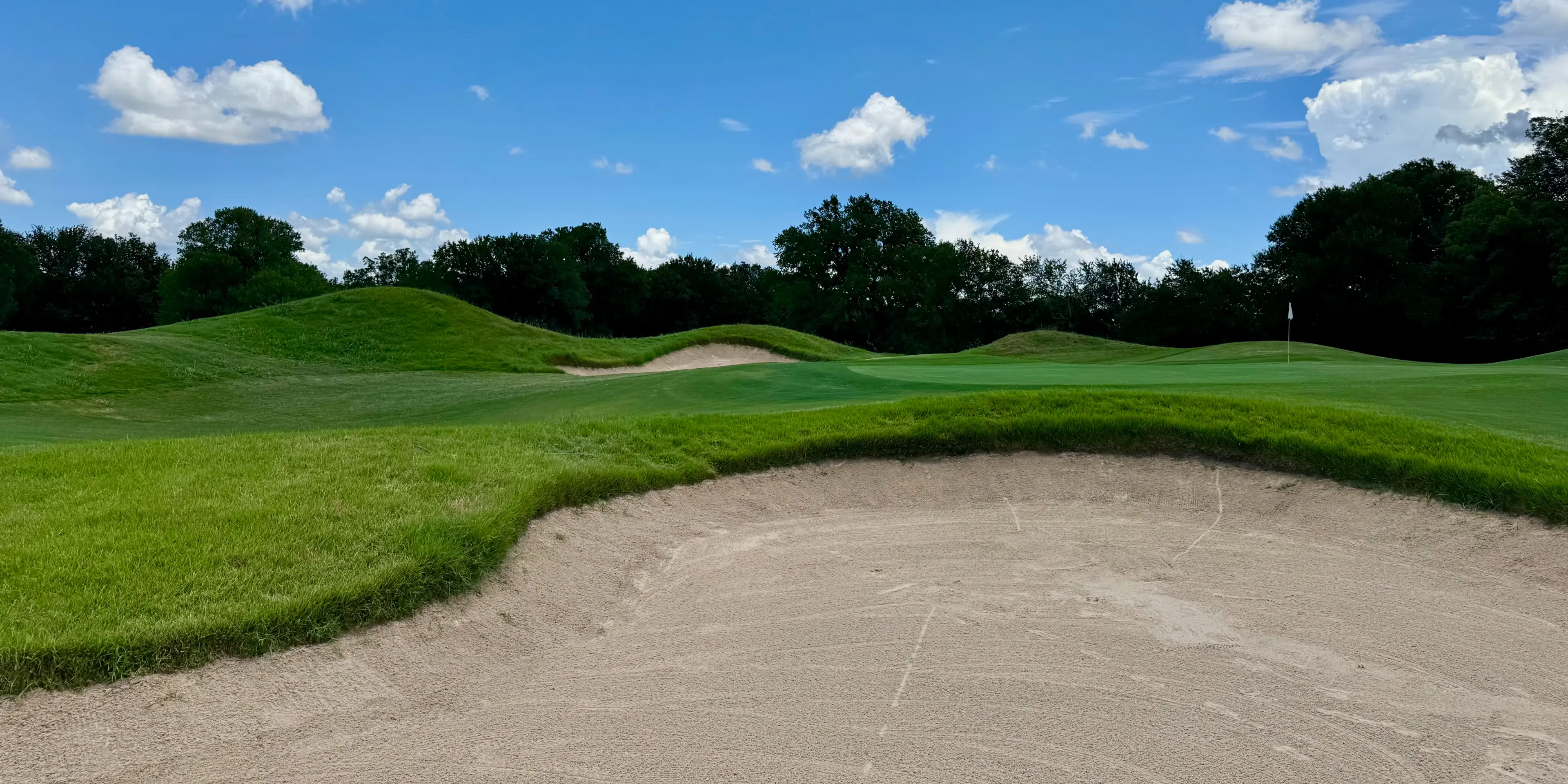 Landscape putting greens and fairway photo of the Split Rail Golf Club golf course