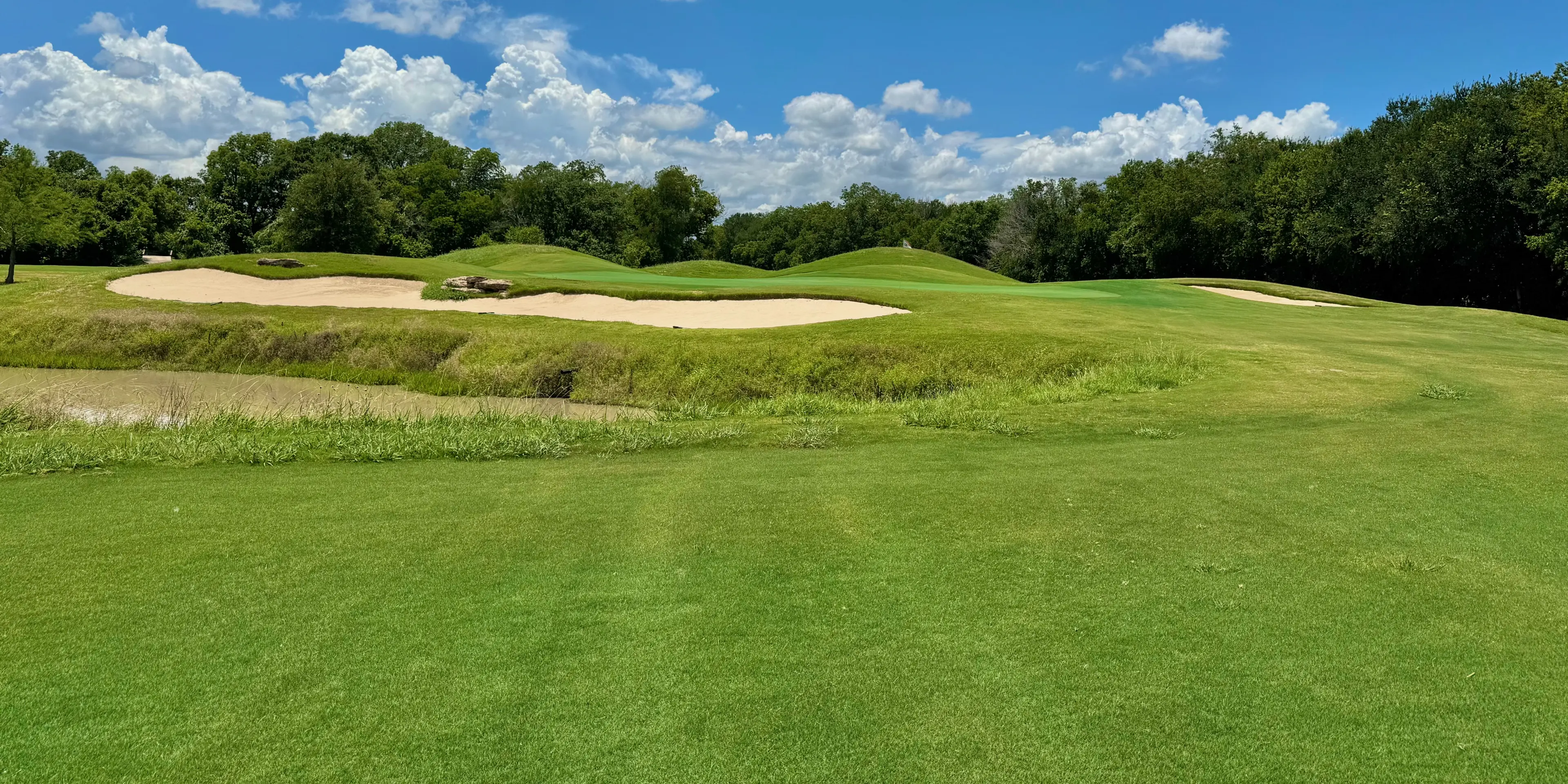 Landscape putting greens and fairway photo of the Split Rail Golf Club golf course