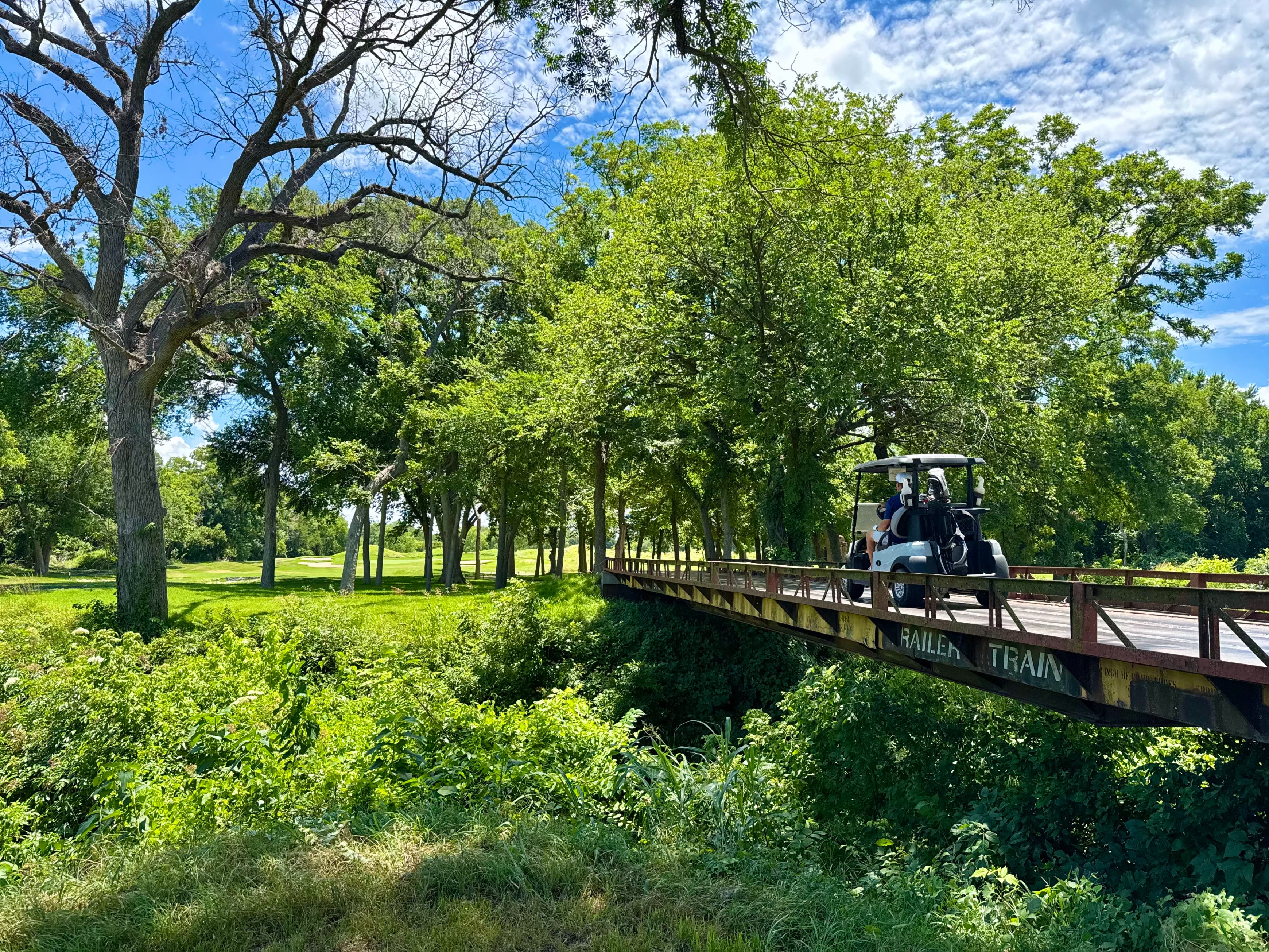 Landscape putting greens and fairway photo of the Split Rail Golf Club golf course