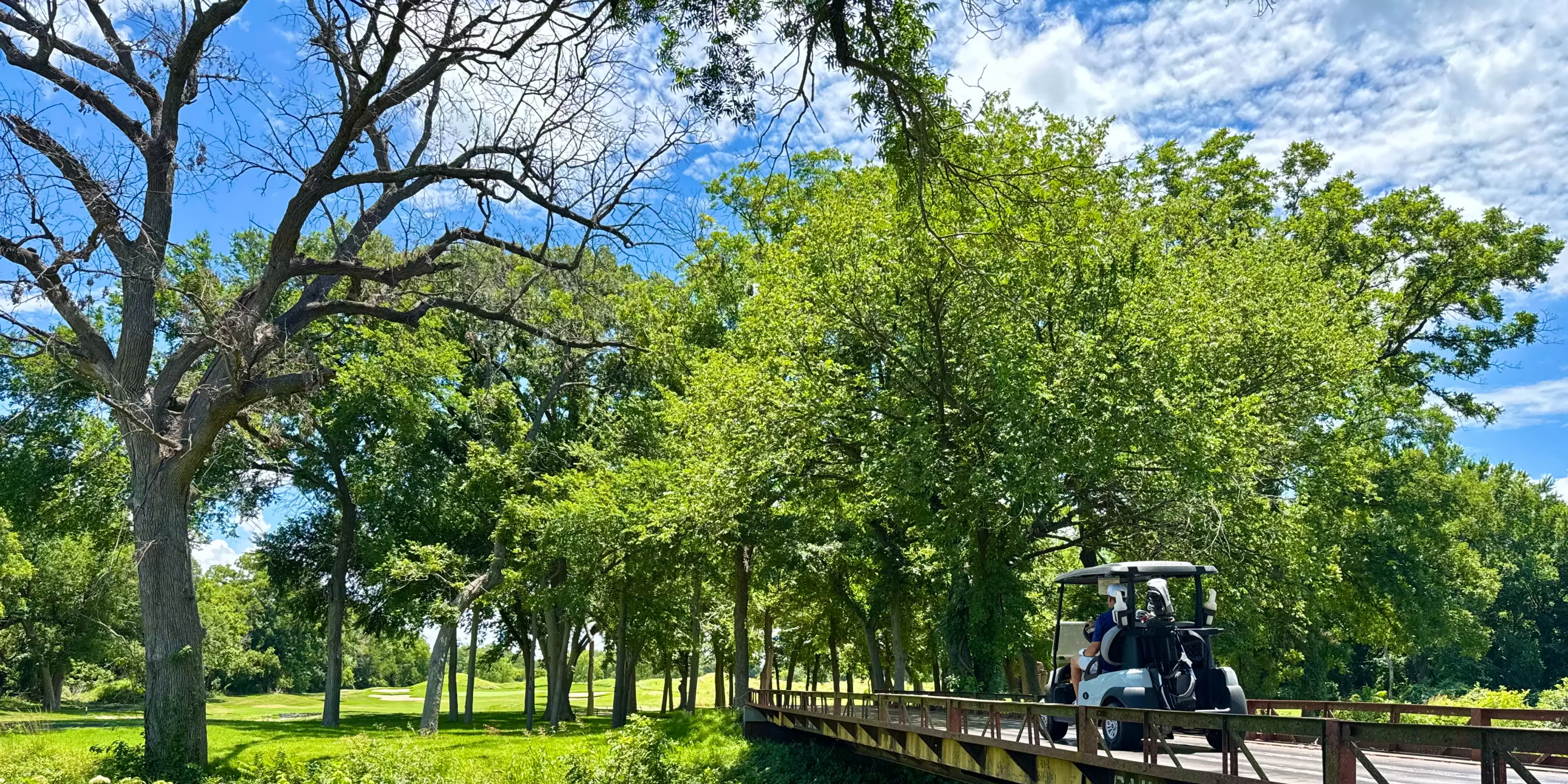 Landscape putting greens and fairway photo of the Split Rail Golf Club golf course