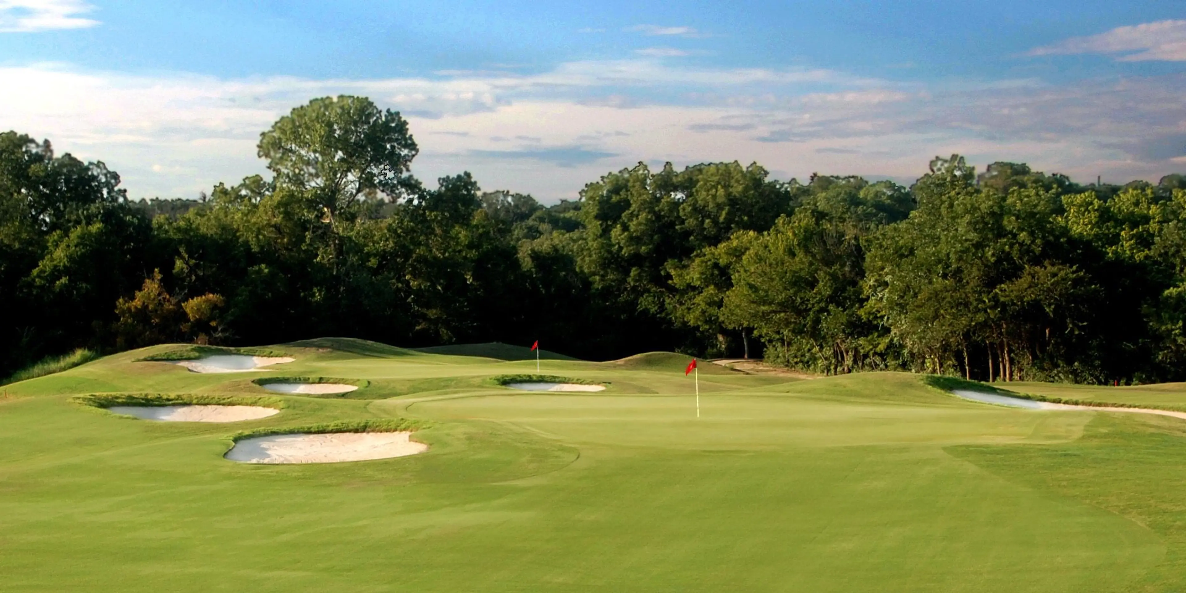 Landscape putting greens and fairway photo of the Split Rail Golf Club golf course