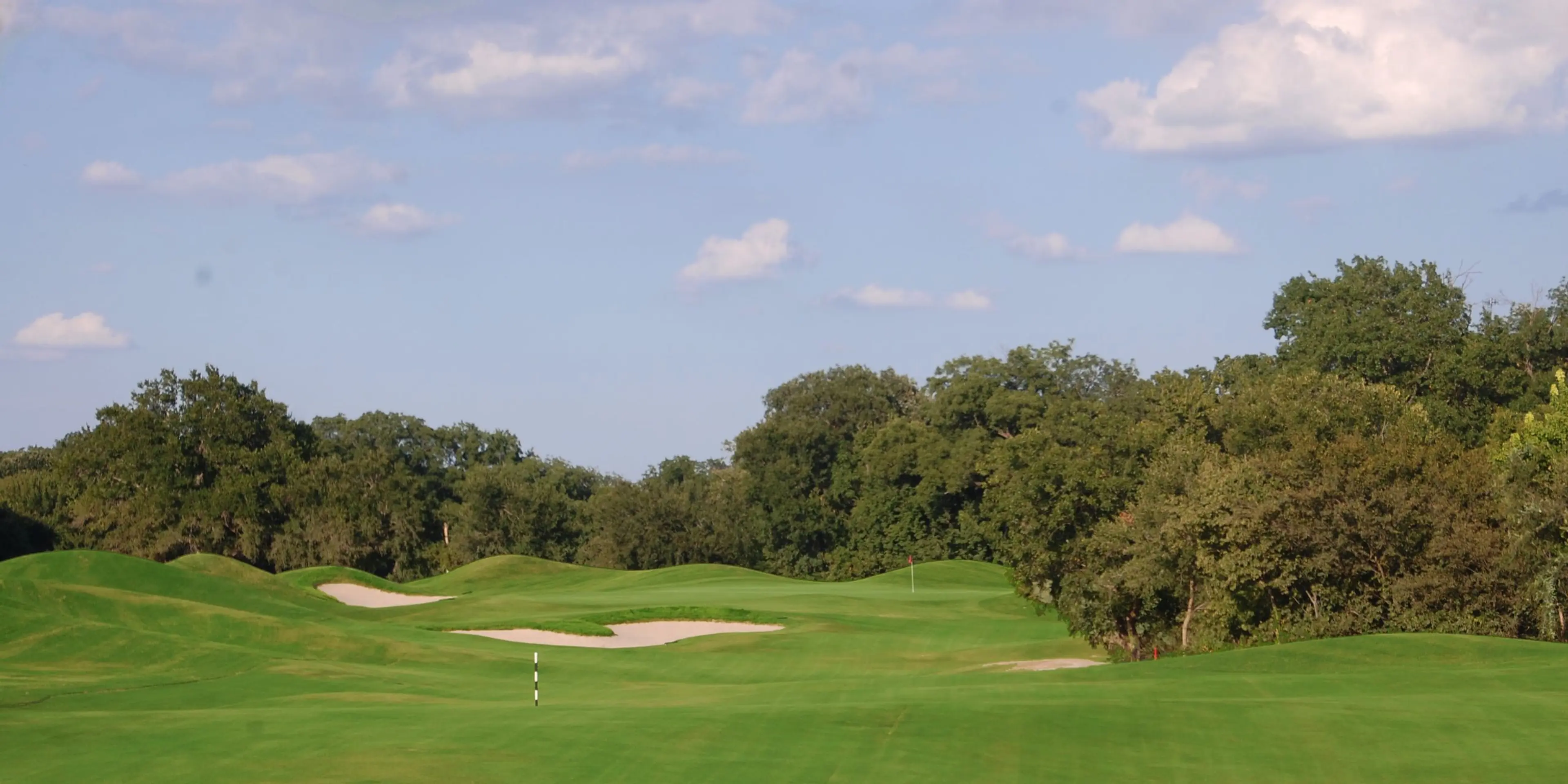 Landscape putting greens and fairway photo of the Split Rail Golf Club golf course
