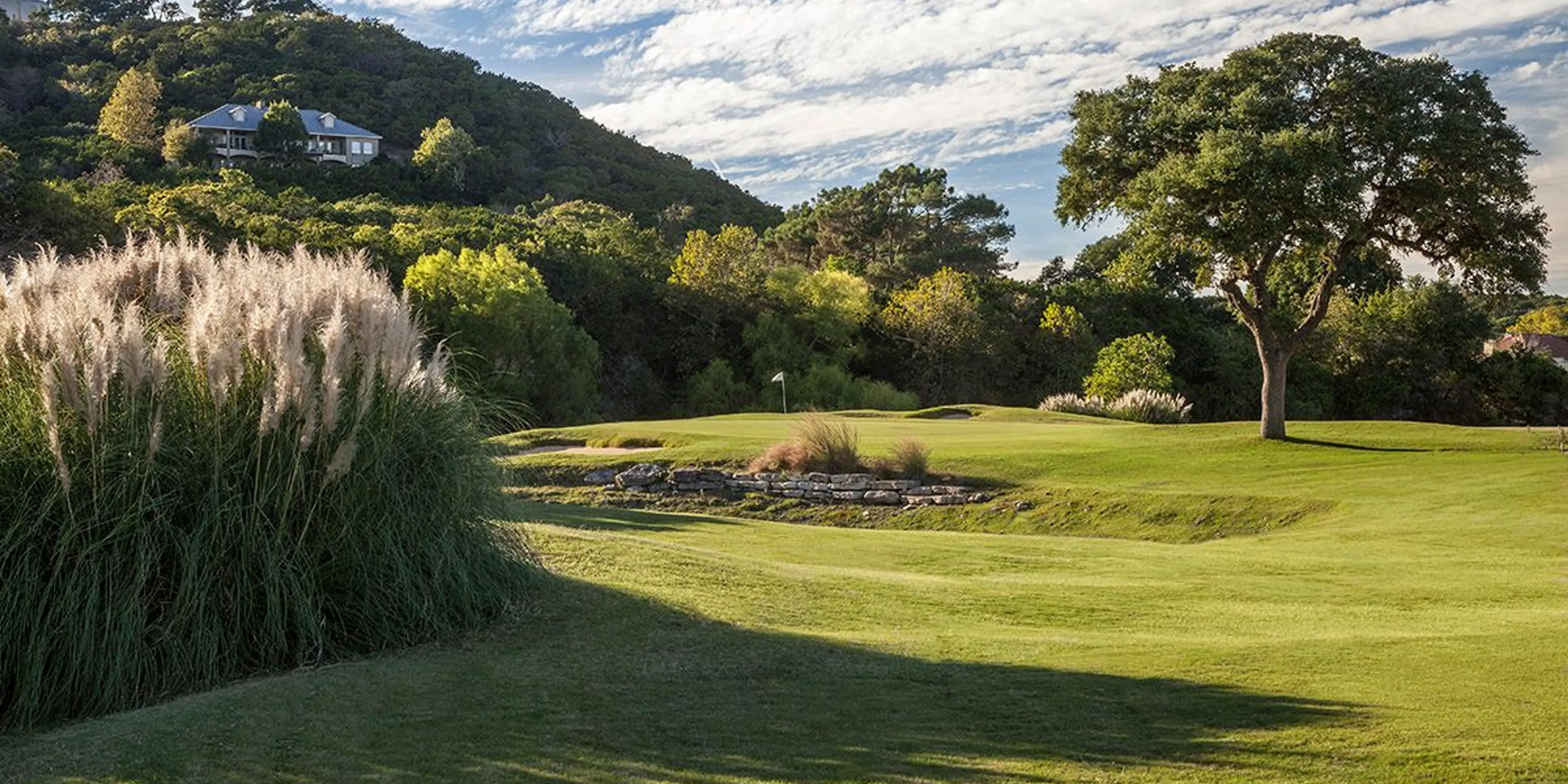 Landscape putting greens and fairway photo of the Tapatio Springs Hill Country Resort golf course