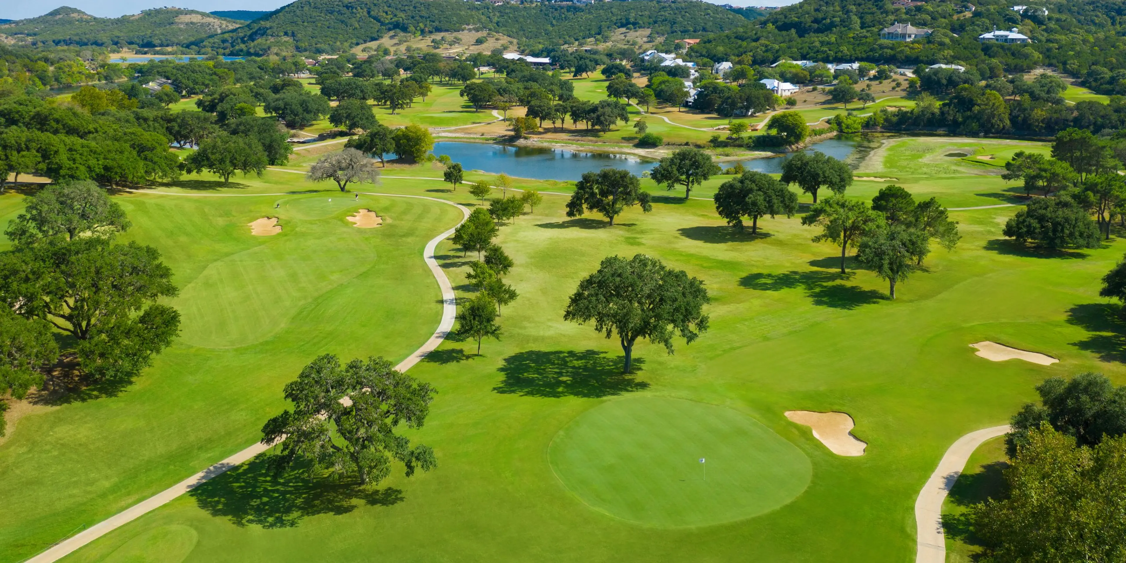 Landscape putting greens and fairway photo of the Tapatio Springs Hill Country Resort golf course