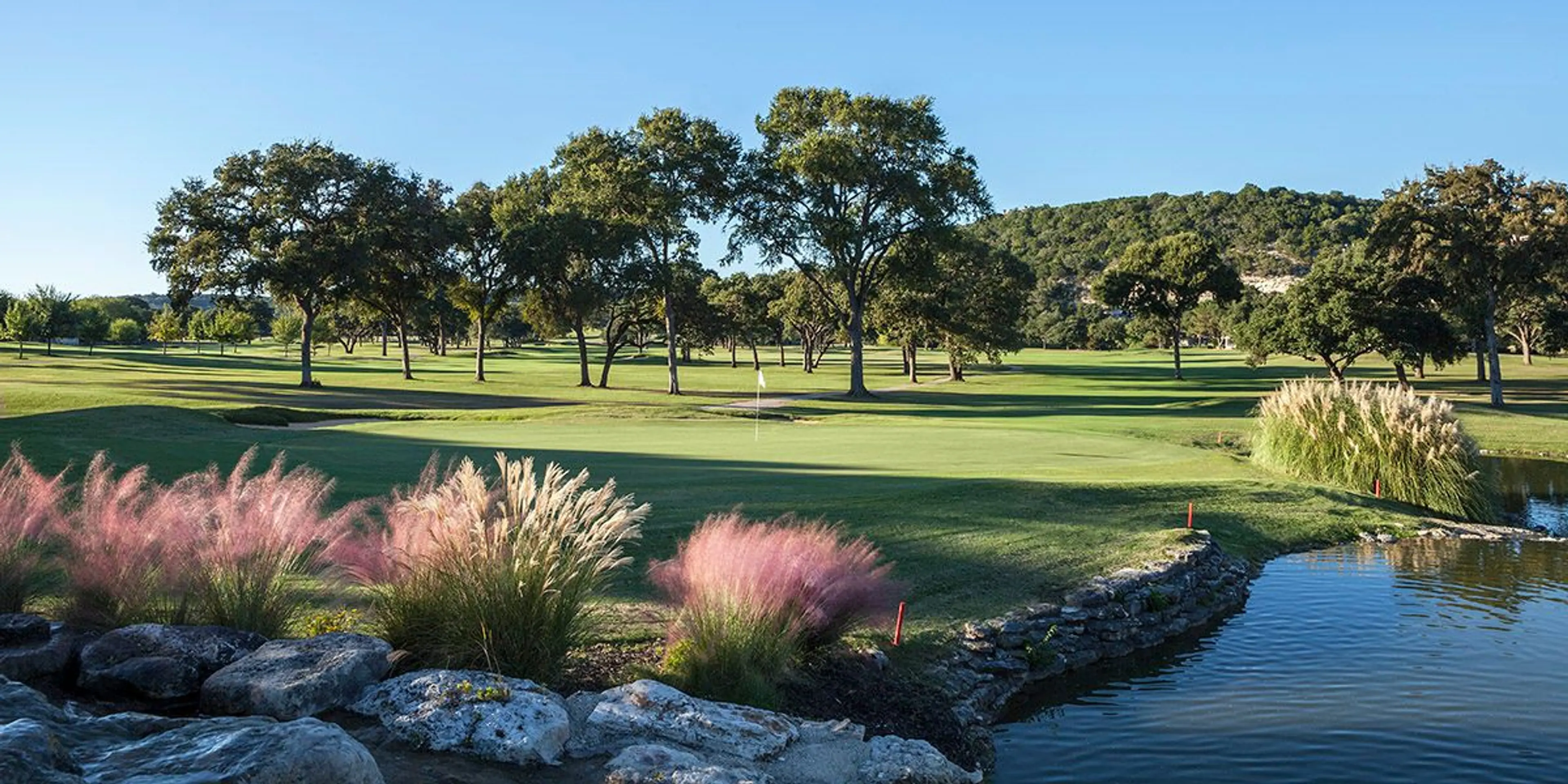 Landscape putting greens and fairway photo of the Tapatio Springs Hill Country Resort golf course