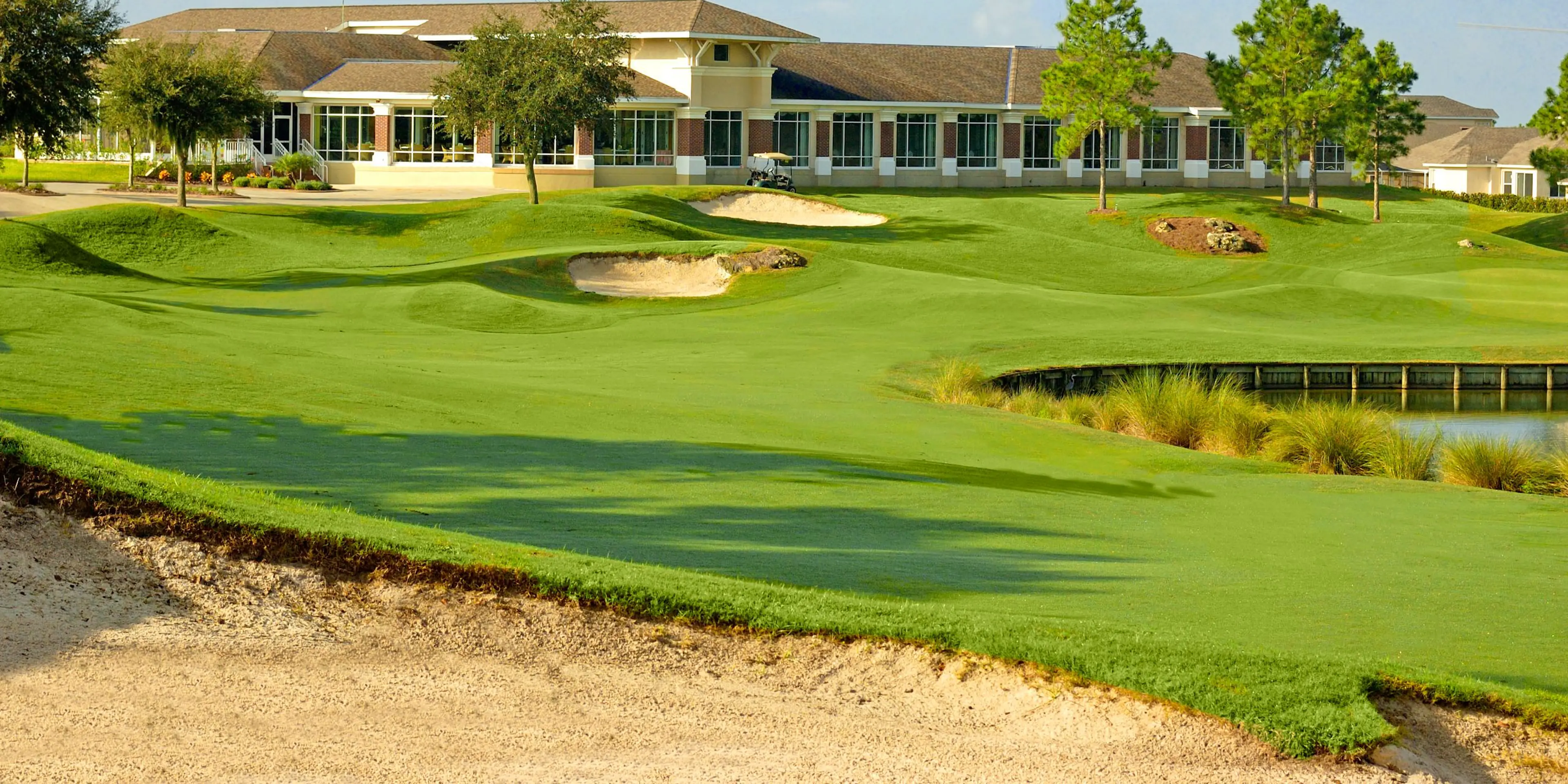 Landscape putting greens and fairway photo of the The Club at Eaglebrooke golf course