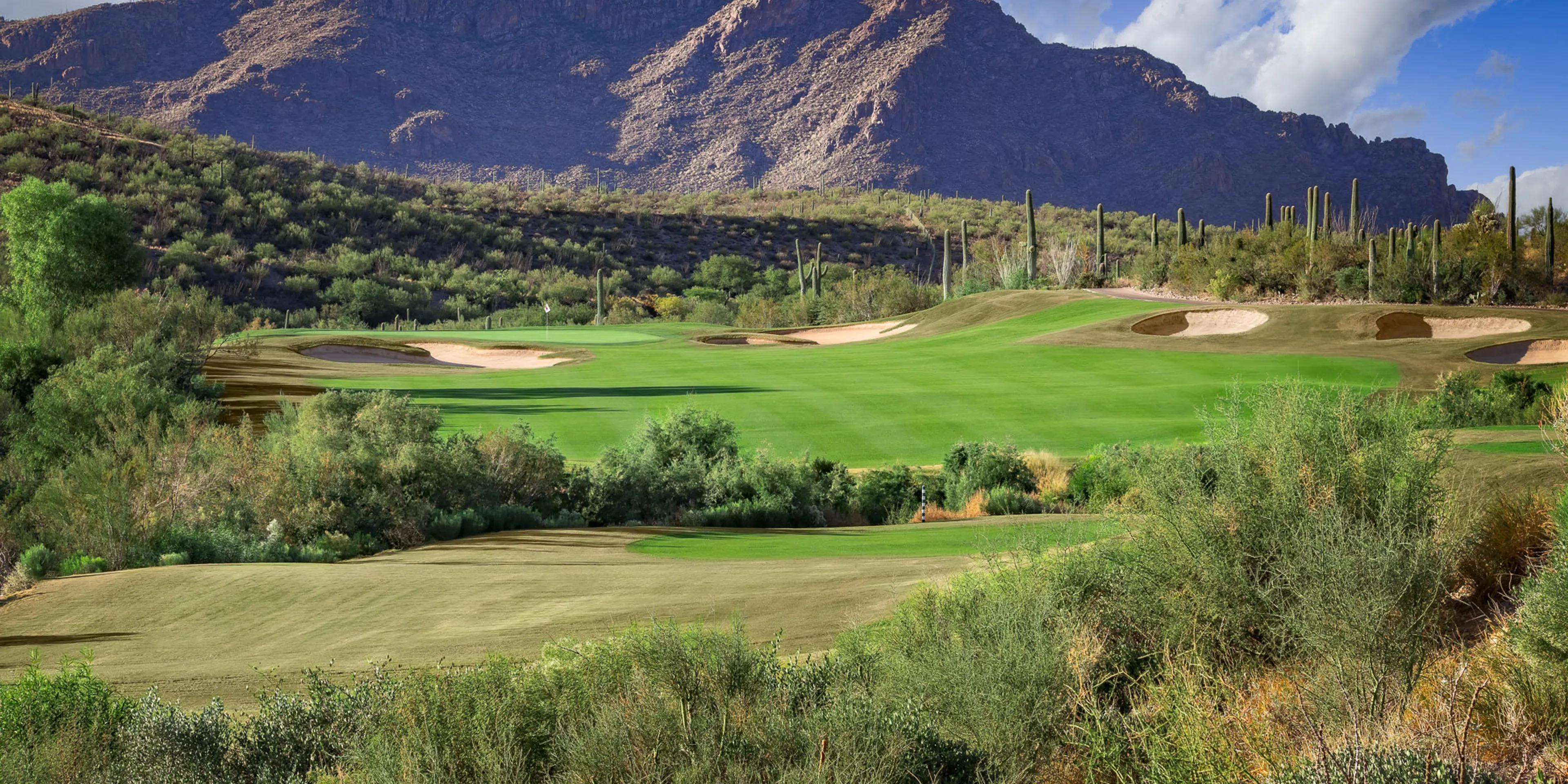 Landscape putting greens and fairway photo of the The Club at Starr Pass golf course