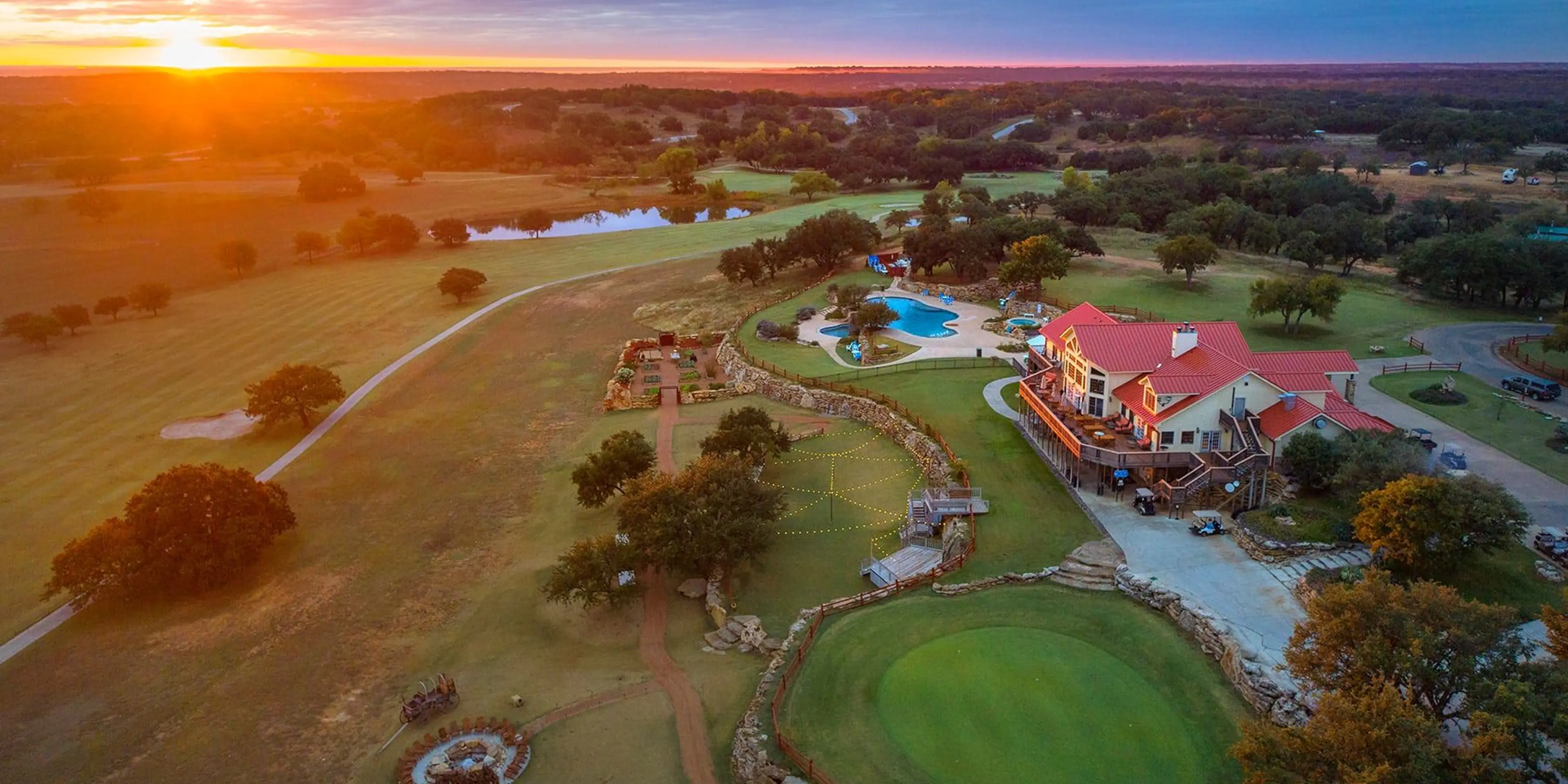 Landscape putting greens and fairway photo of the The Hideout Golf Club & Resort golf course