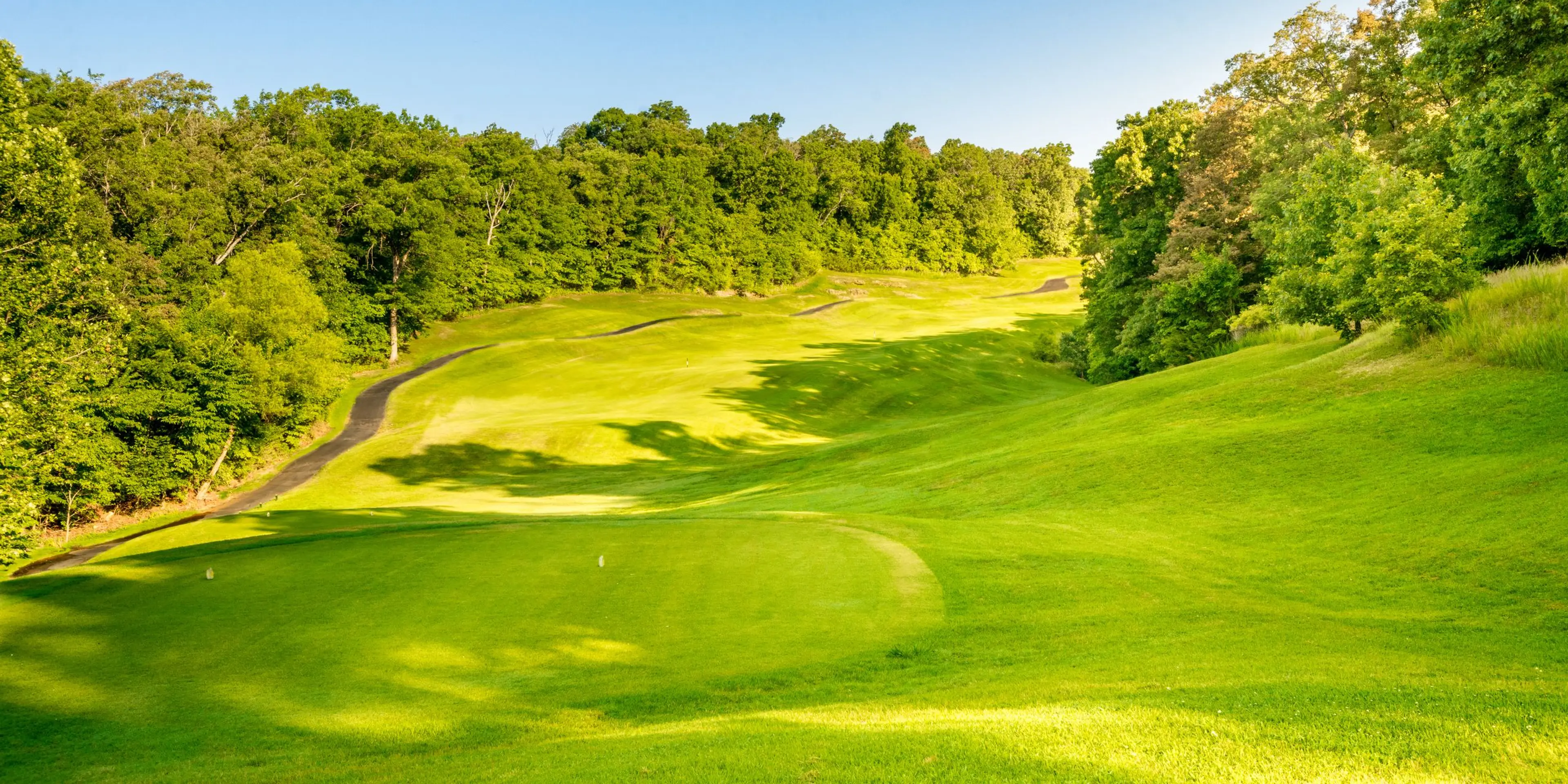 Landscape putting greens and fairway photo of the The Lodge of Four Seasons golf course