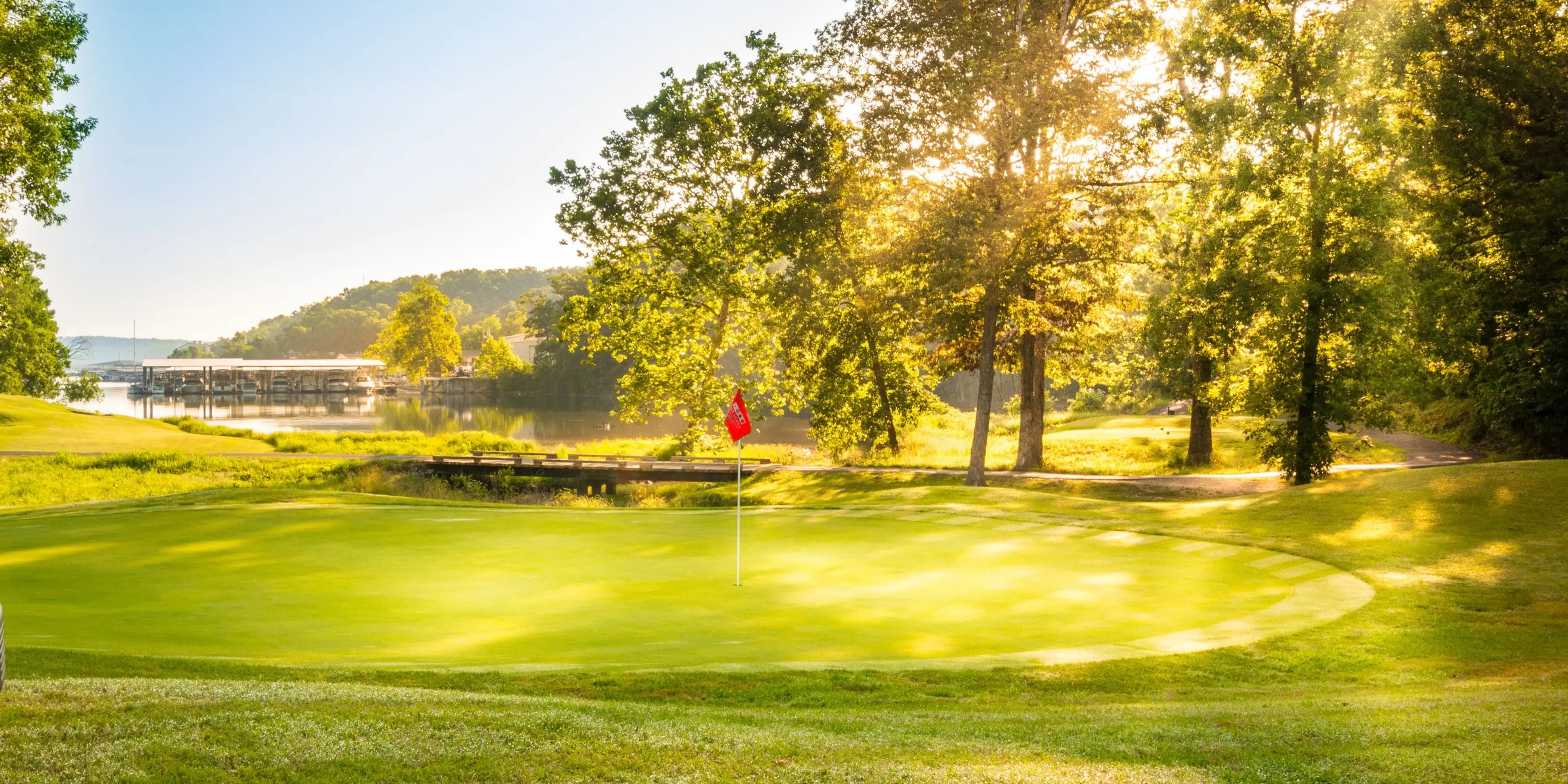 Landscape putting greens and fairway photo of the The Lodge of Four Seasons golf course