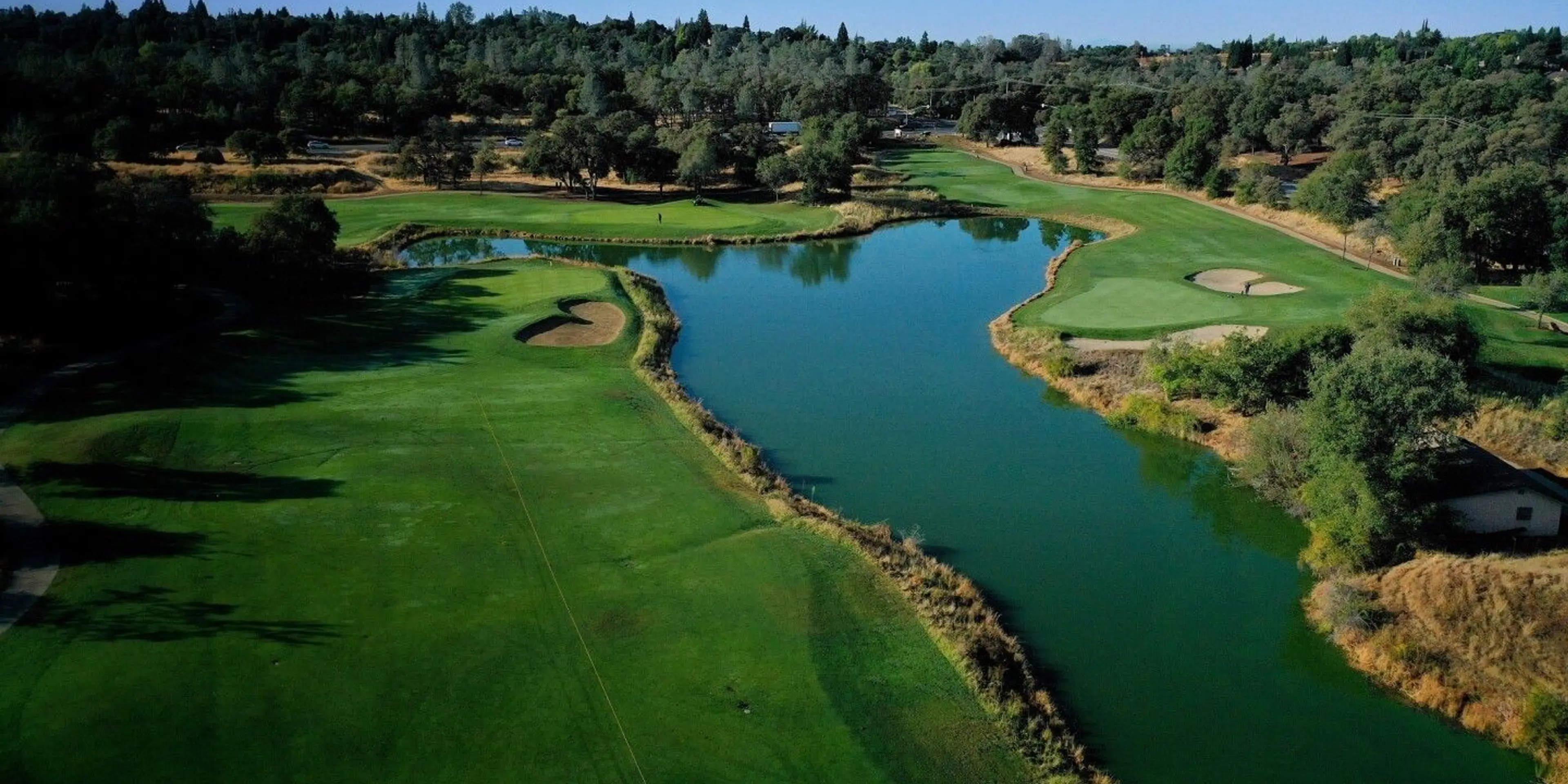 Landscape putting greens and fairway photo of the The Ridge Golf and Event Center golf course