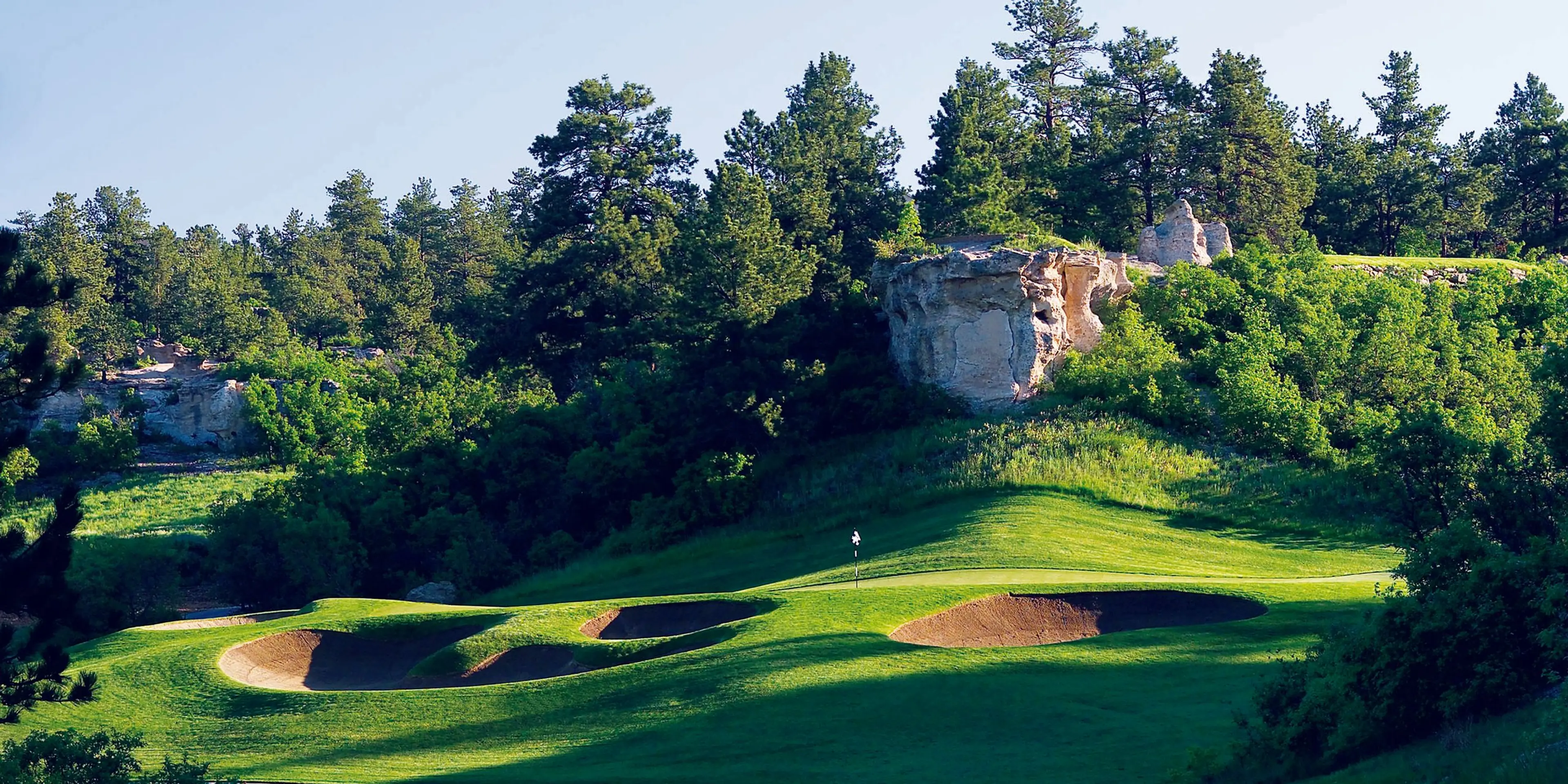 Landscape putting greens and fairway photo of the The Ridge golf course