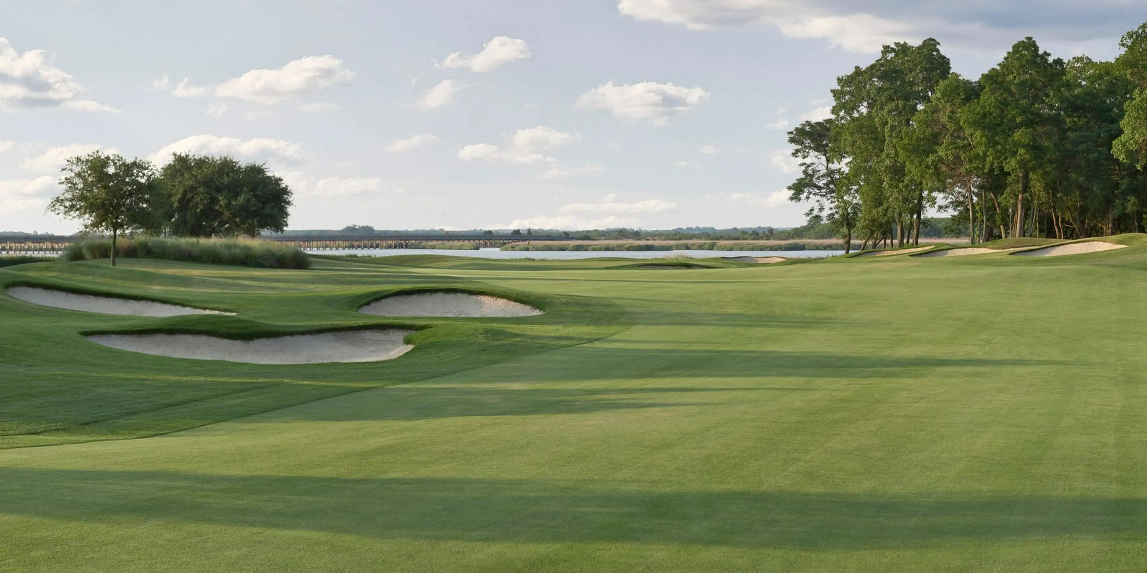 Landscape putting greens and fairway photo of the The Westin Savannah Harbor Golf Resort & Spa golf course