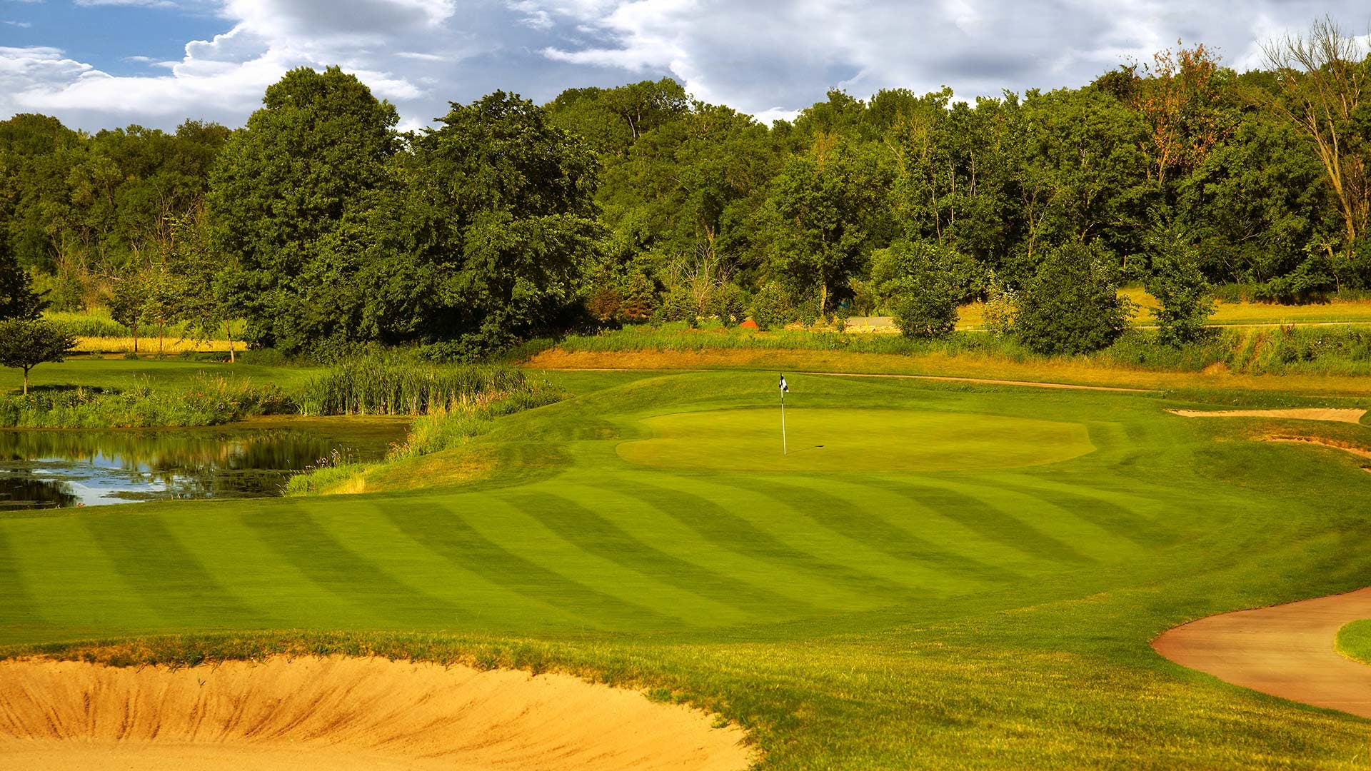 Landscape putting greens and fairway photo of the The Wilds Golf Club golf course