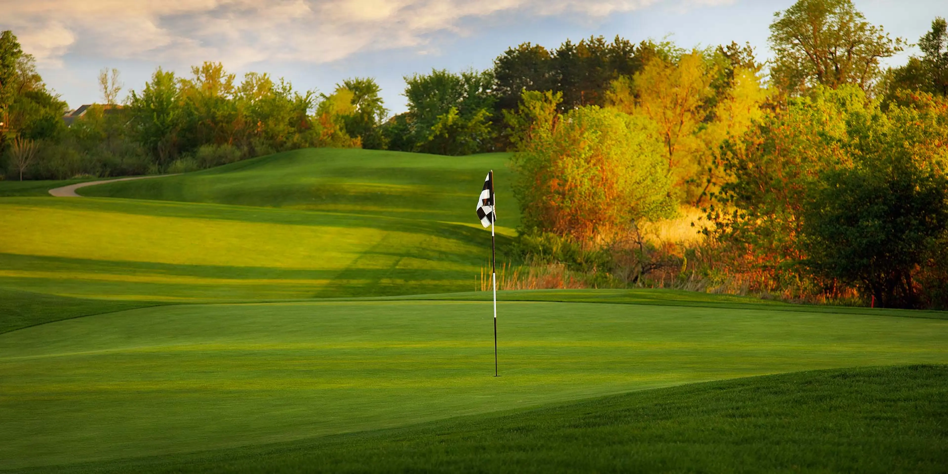 Landscape putting greens and fairway photo of the The Wilds Golf Club golf course