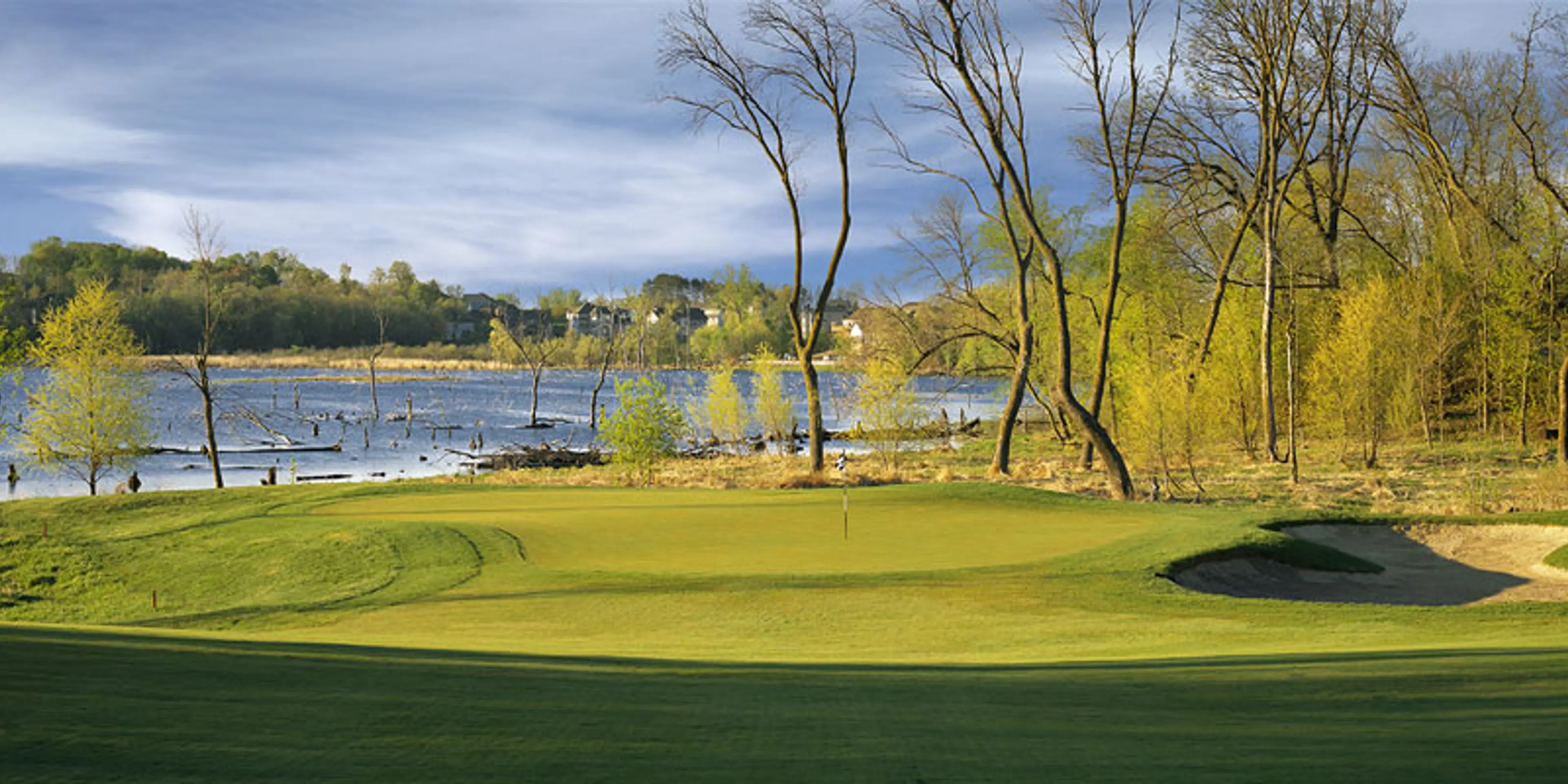 Landscape putting greens and fairway photo of the The Wilds Golf Club golf course