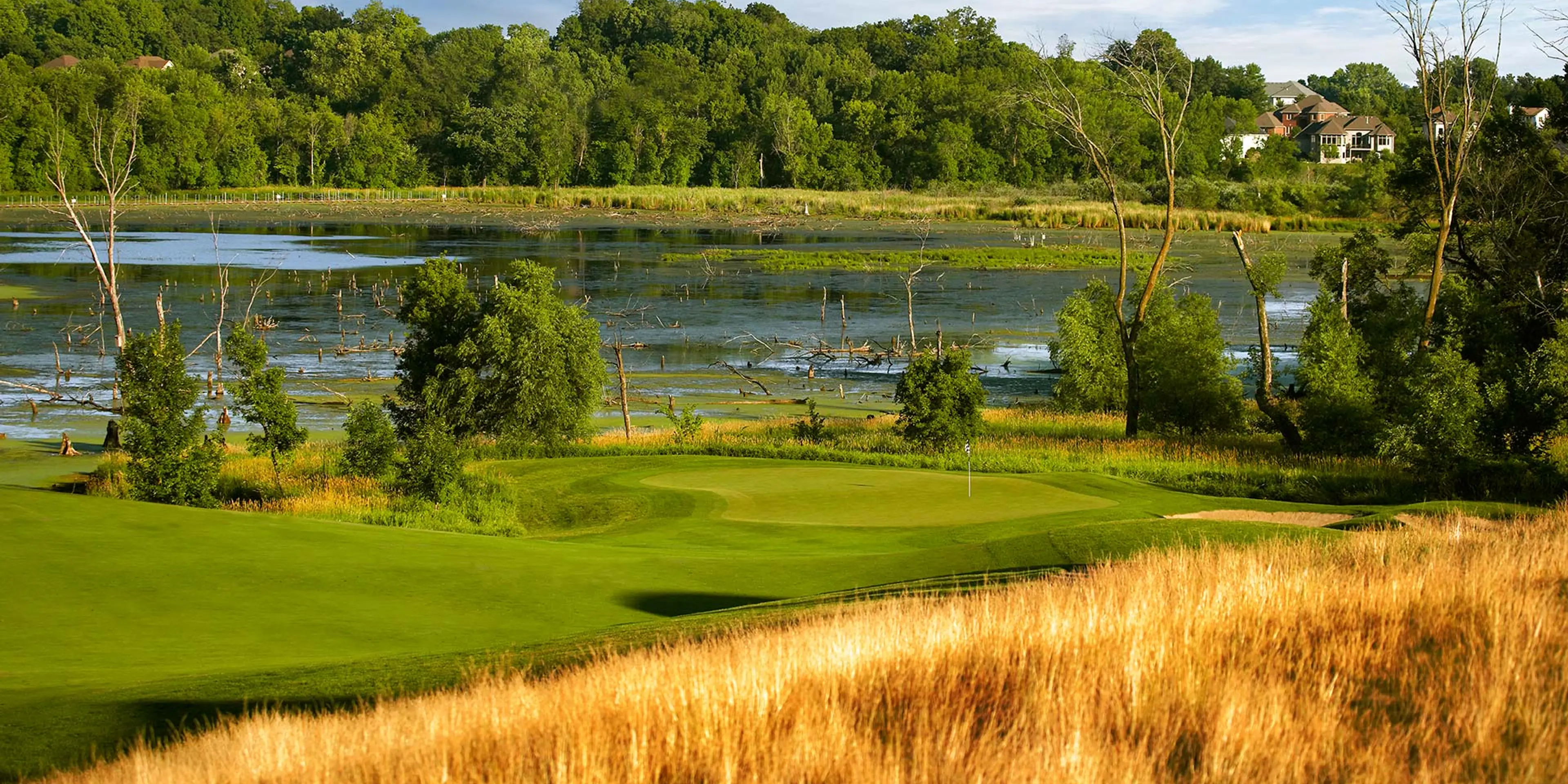Landscape putting greens and fairway photo of the The Wilds Golf Club golf course