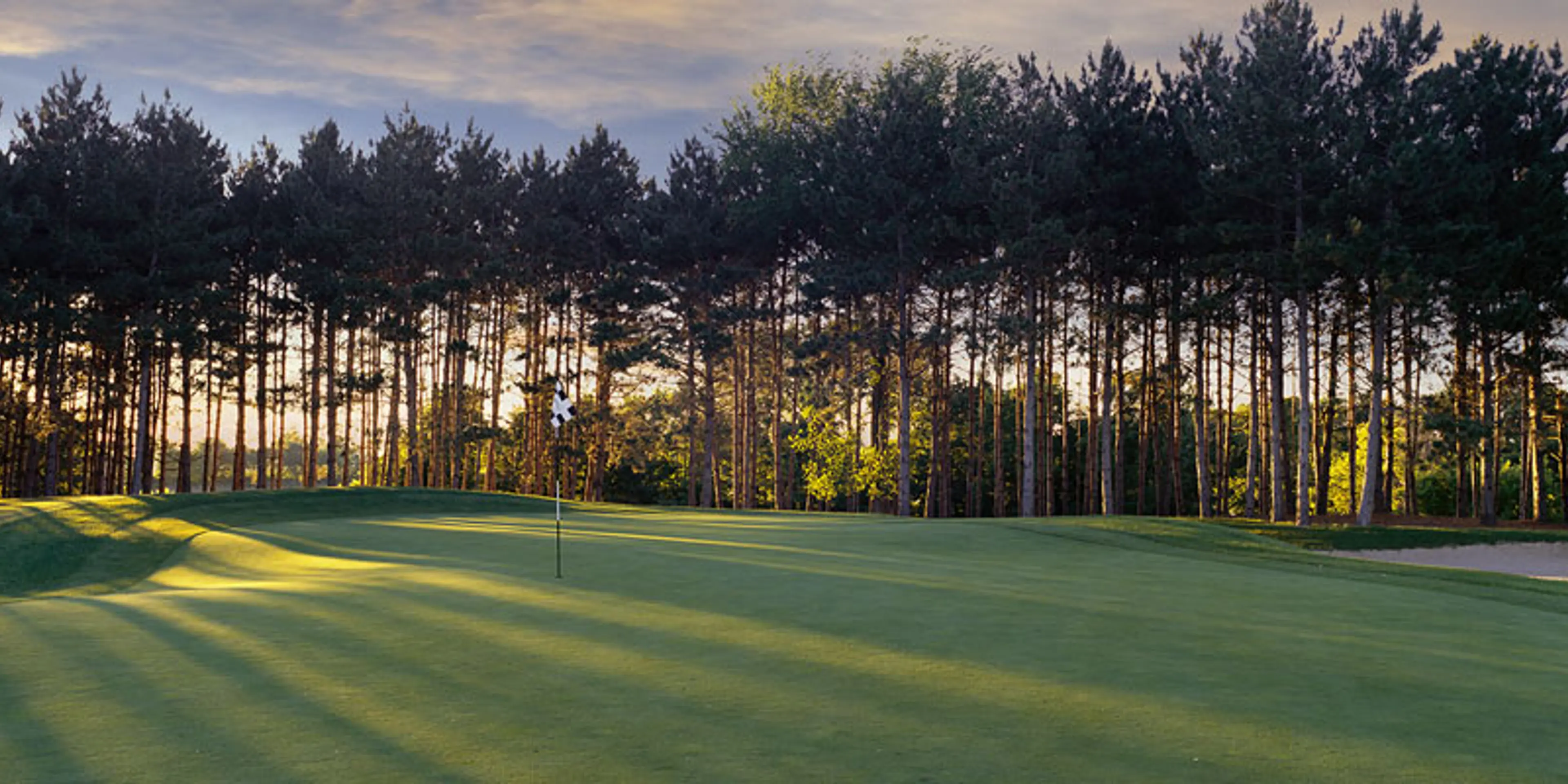 Landscape putting greens and fairway photo of the The Wilds Golf Club golf course