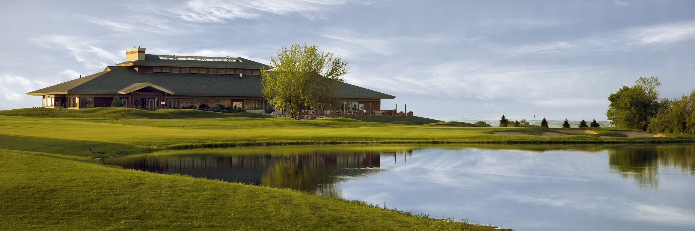 Landscape putting greens and fairway photo of the The Wilds Golf Club golf course