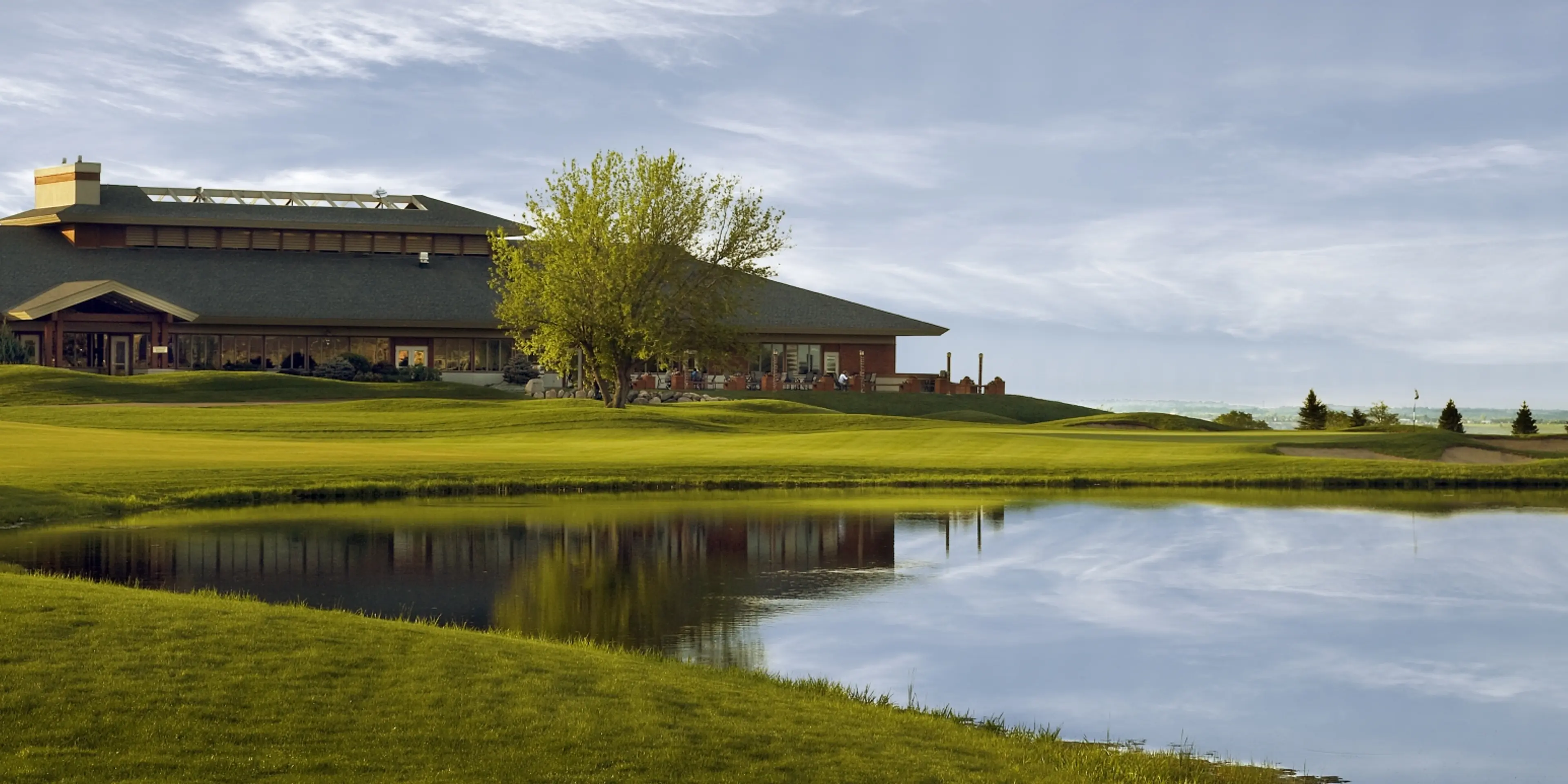 Landscape putting greens and fairway photo of the The Wilds Golf Club golf course