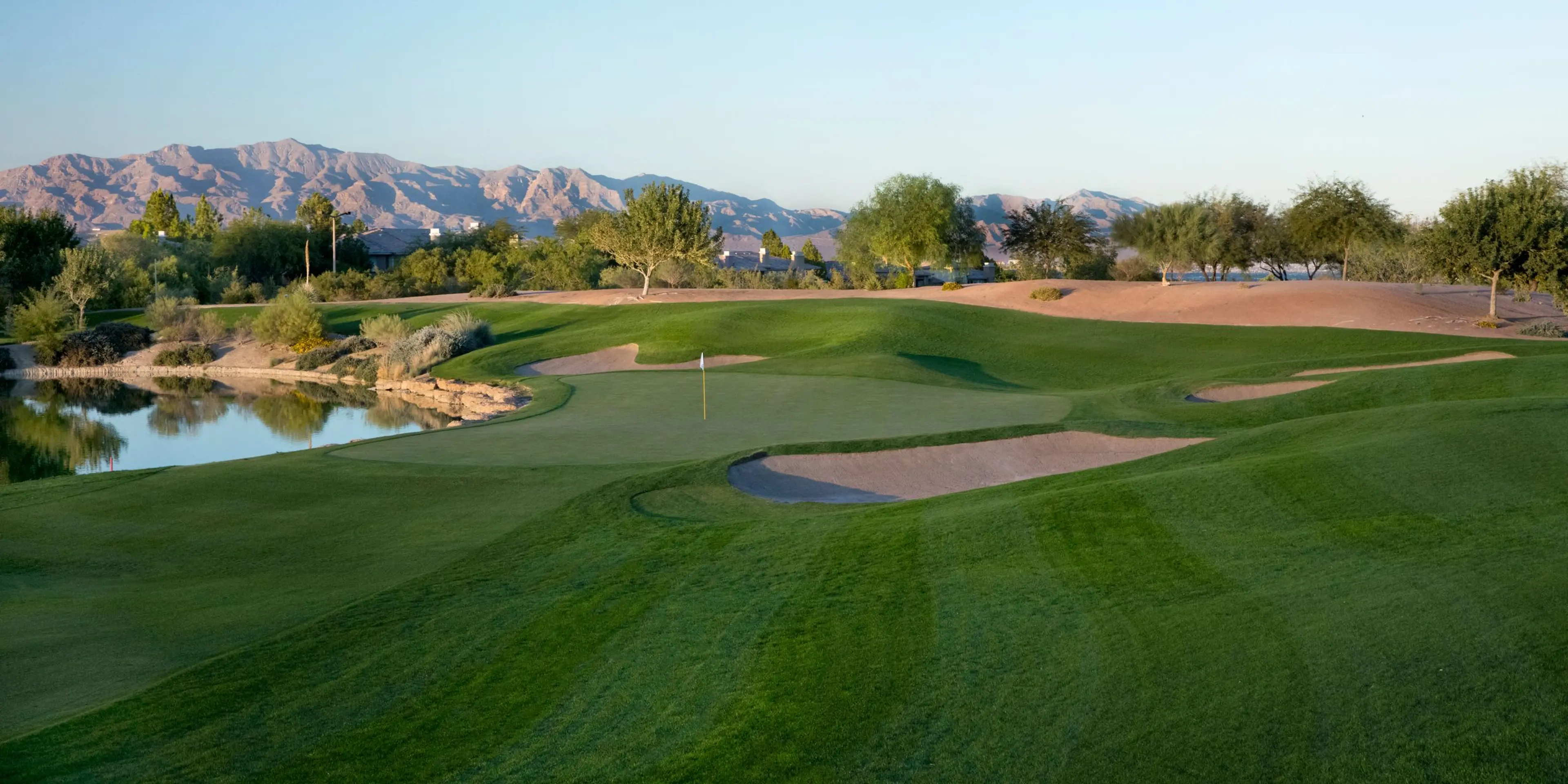 Landscape putting greens and fairway photo of the TPC Las Vegas golf course