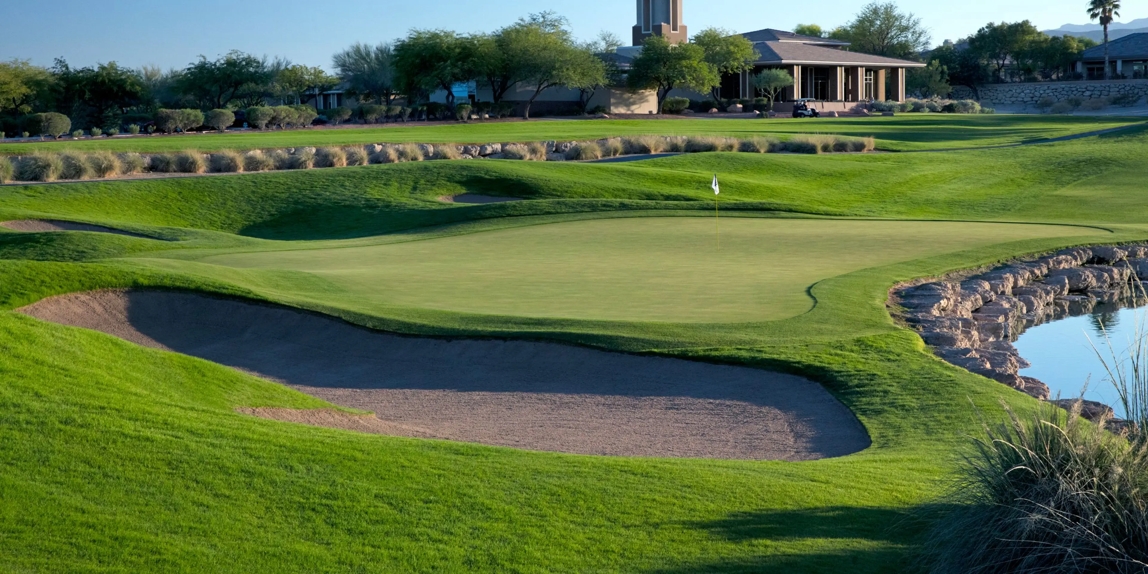 Landscape putting greens and fairway photo of the TPC Las Vegas golf course