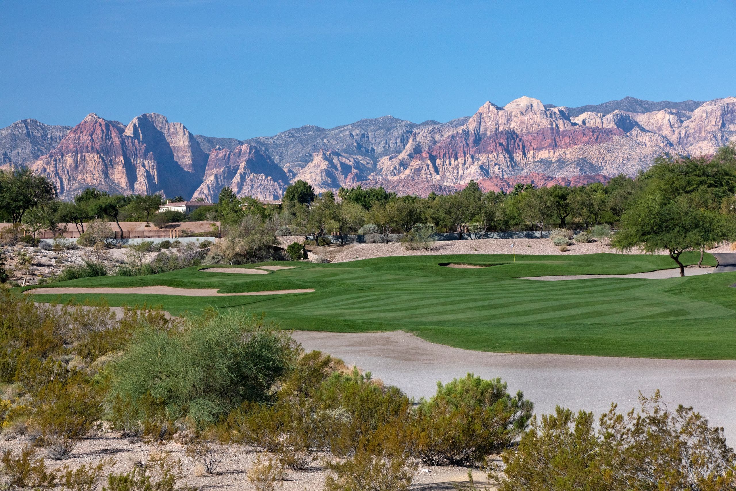 Landscape putting greens and fairway photo of the TPC Las Vegas golf course
