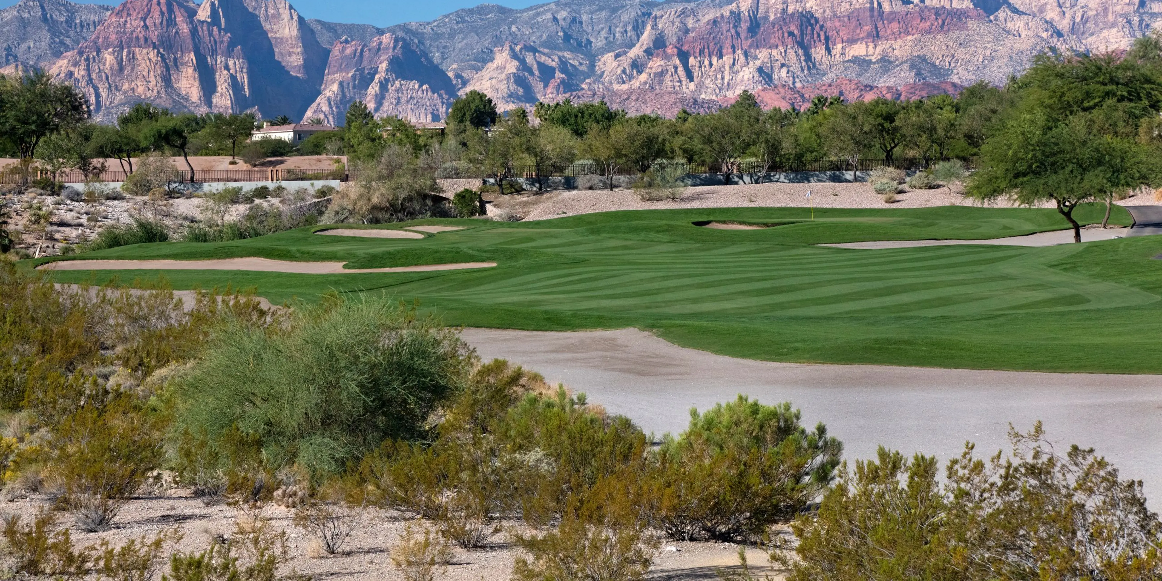 Landscape putting greens and fairway photo of the TPC Las Vegas golf course