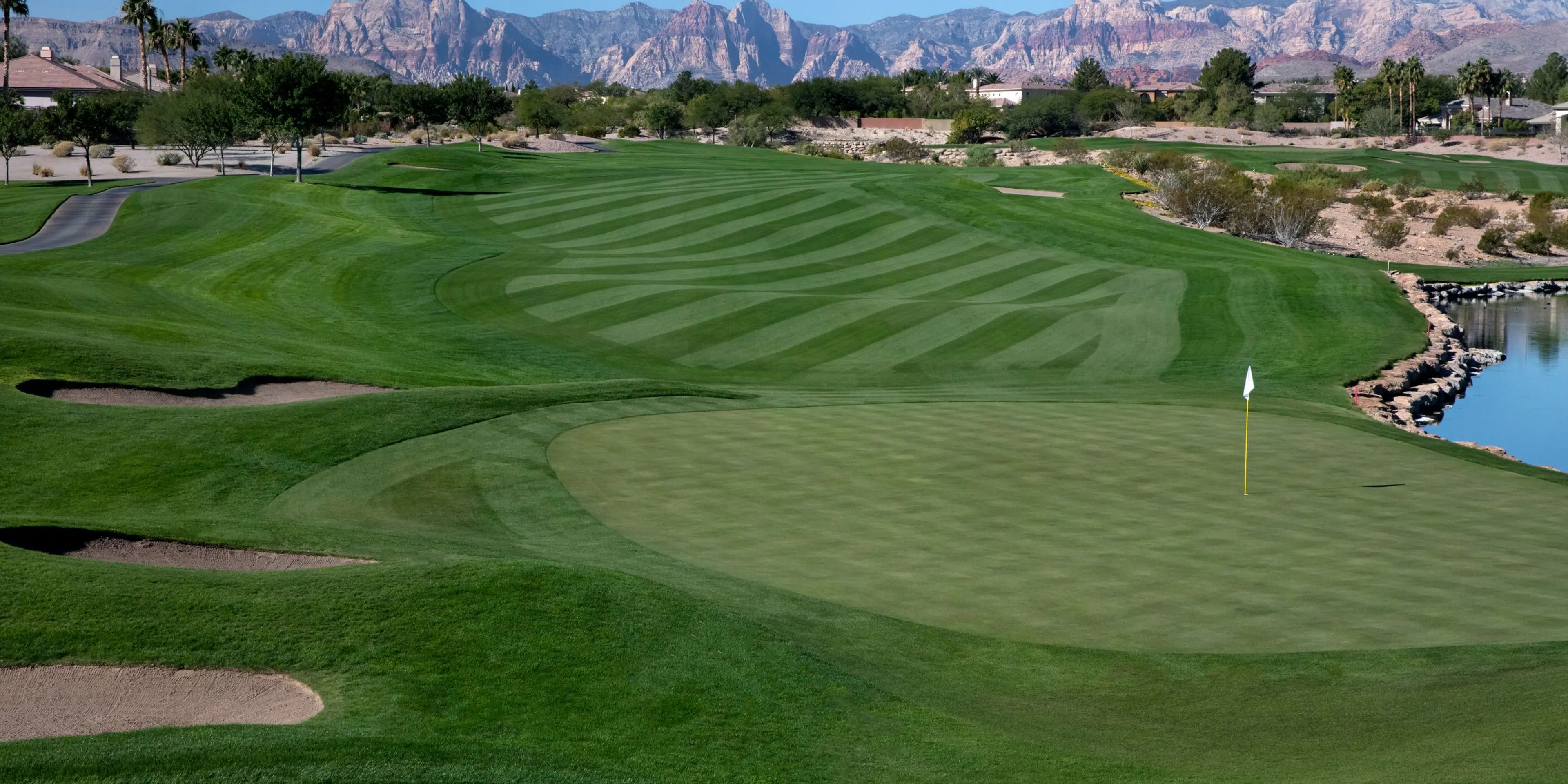 Landscape putting greens and fairway photo of the TPC Las Vegas golf course