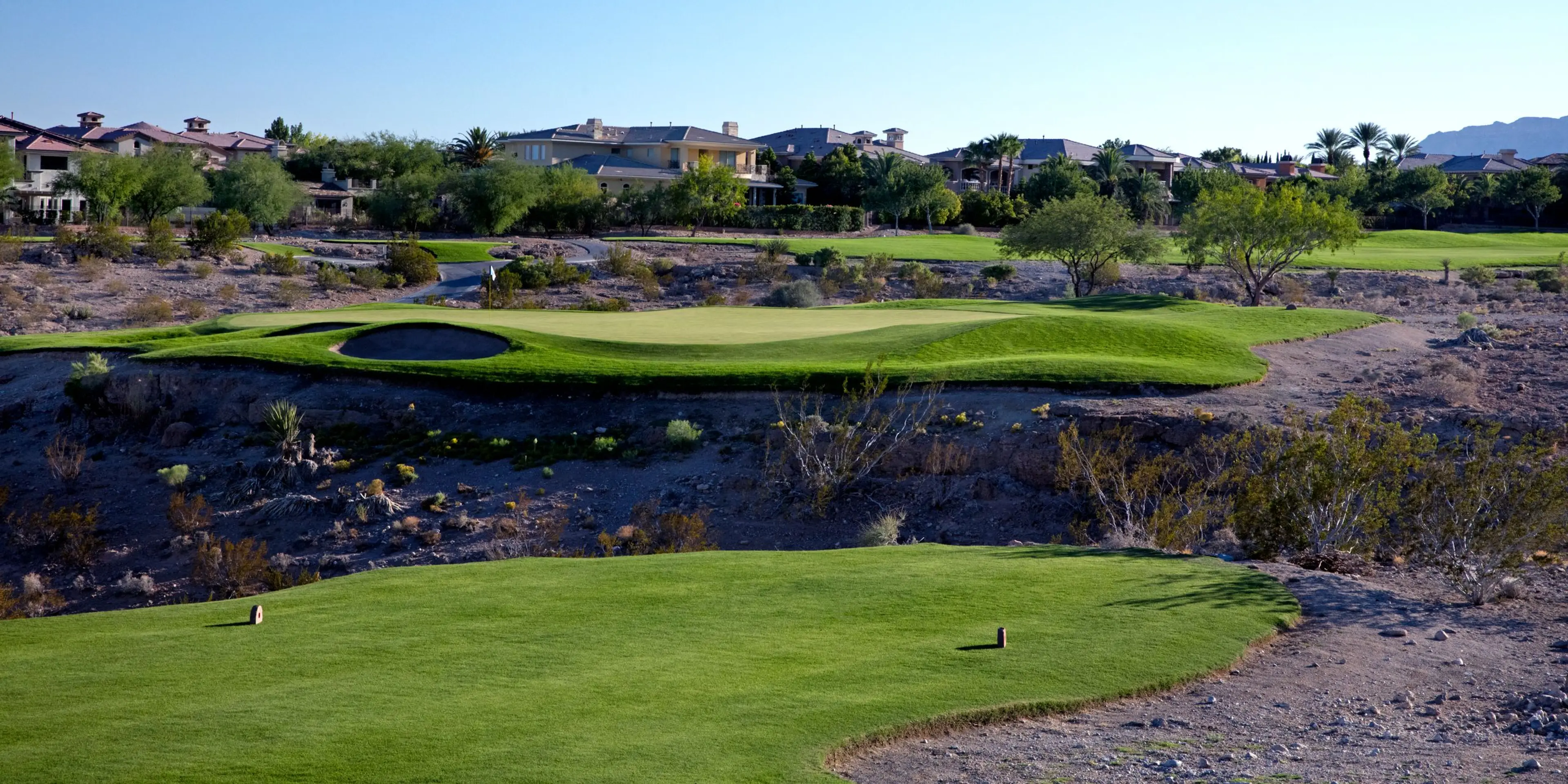 Landscape putting greens and fairway photo of the TPC Las Vegas golf course