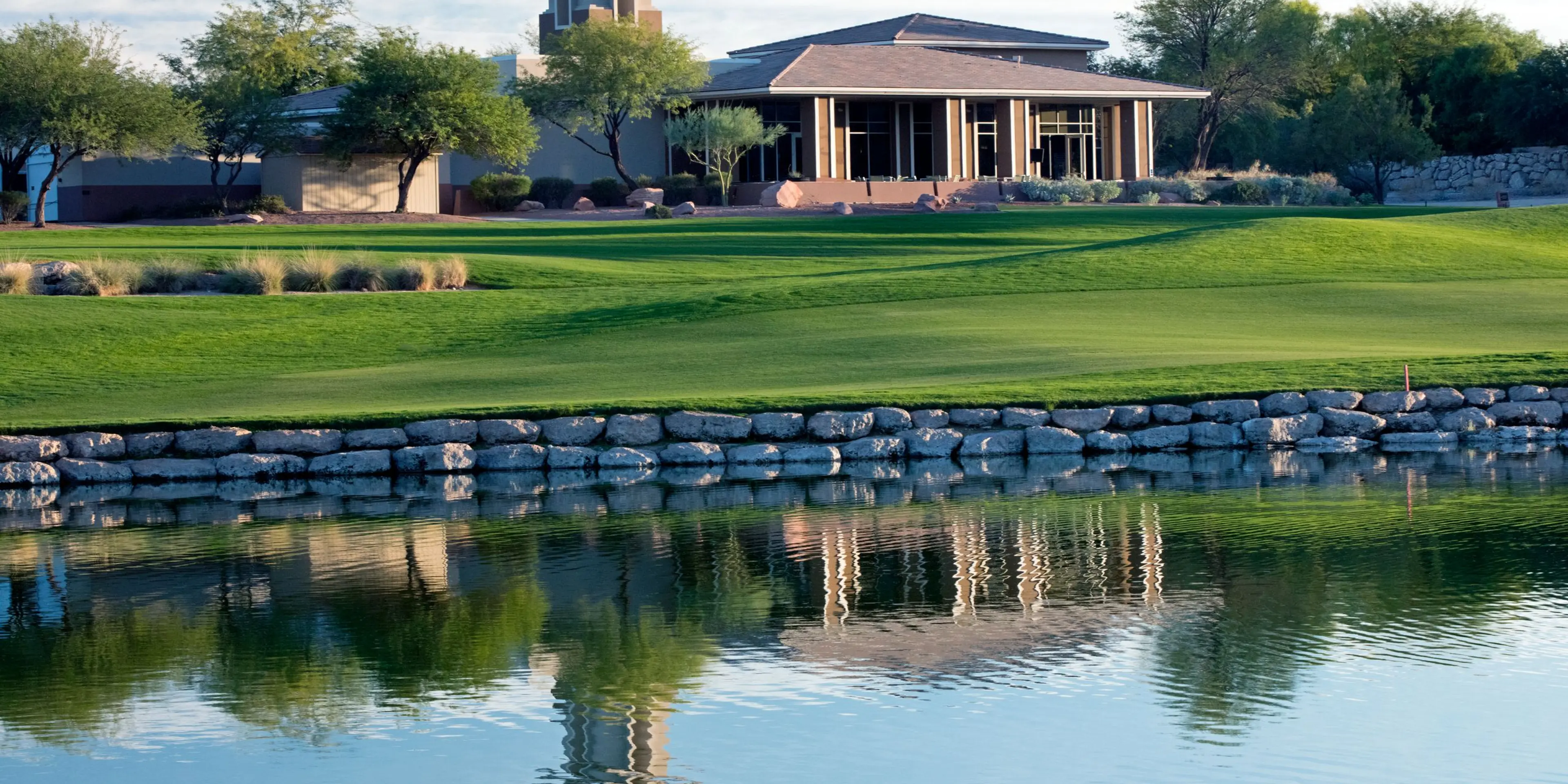 Landscape putting greens and fairway photo of the TPC Las Vegas golf course