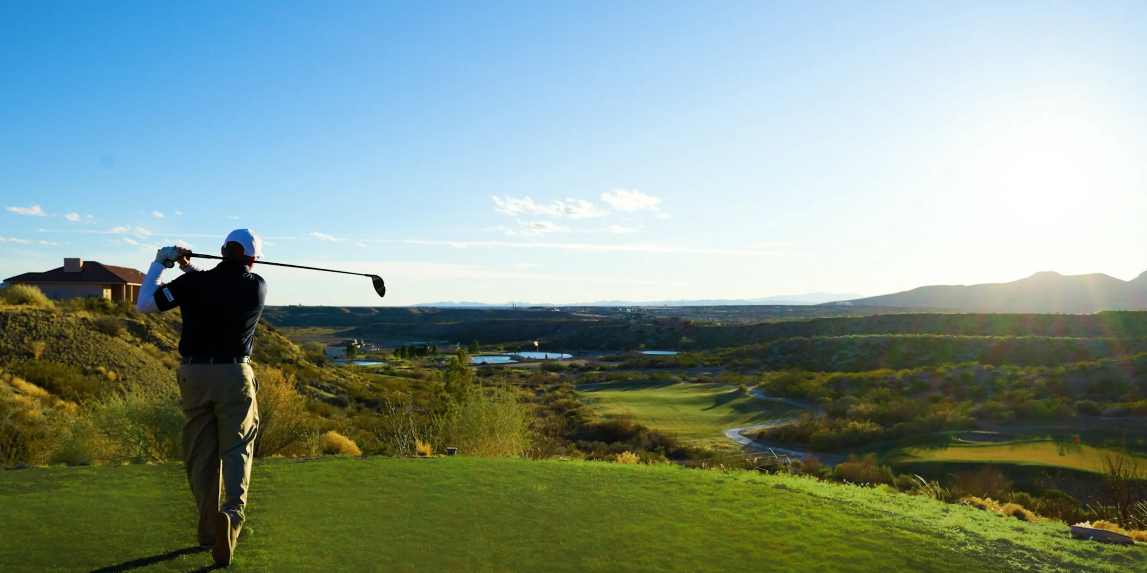 Landscape putting greens and fairway photo of the Turtleback Mountain Golf & Resort golf course