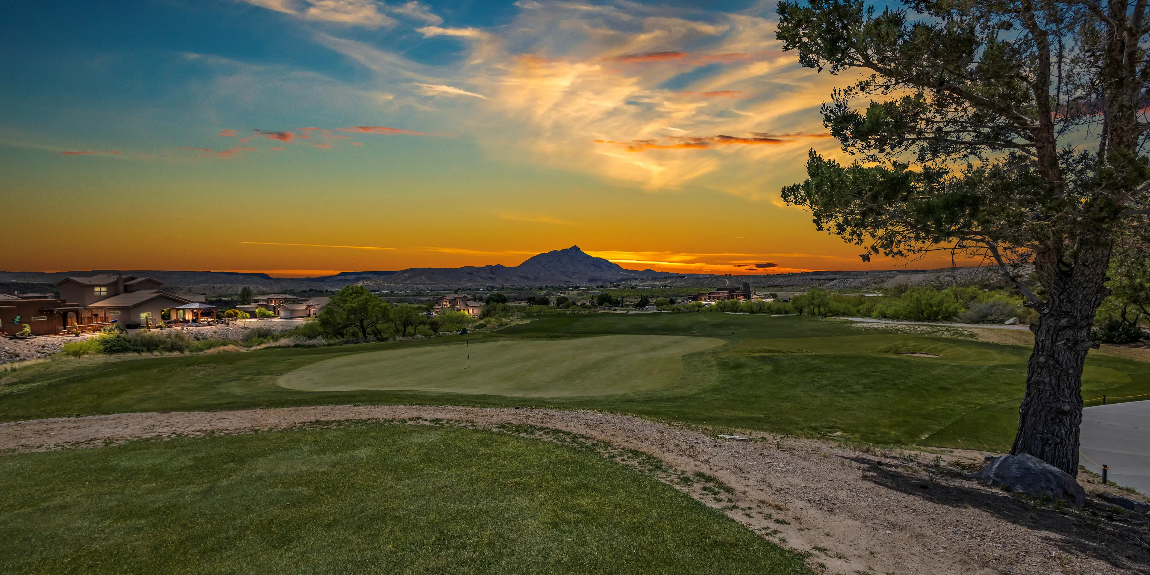 Landscape putting greens and fairway photo of the Turtleback Mountain Golf & Resort golf course