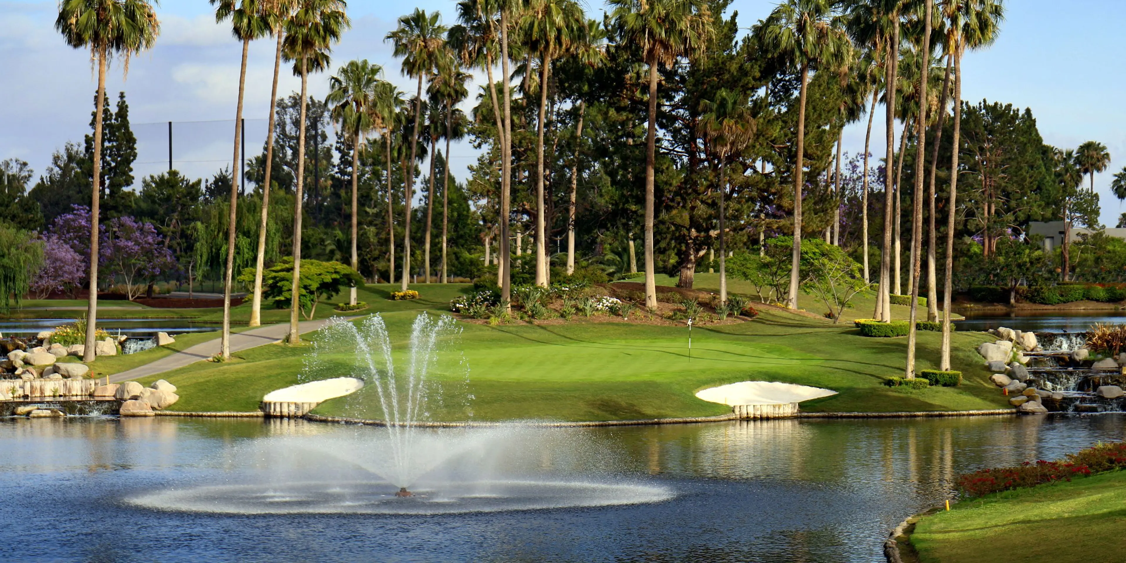 Landscape putting greens and fairway photo of the Tustin Ranch Golf Club golf course