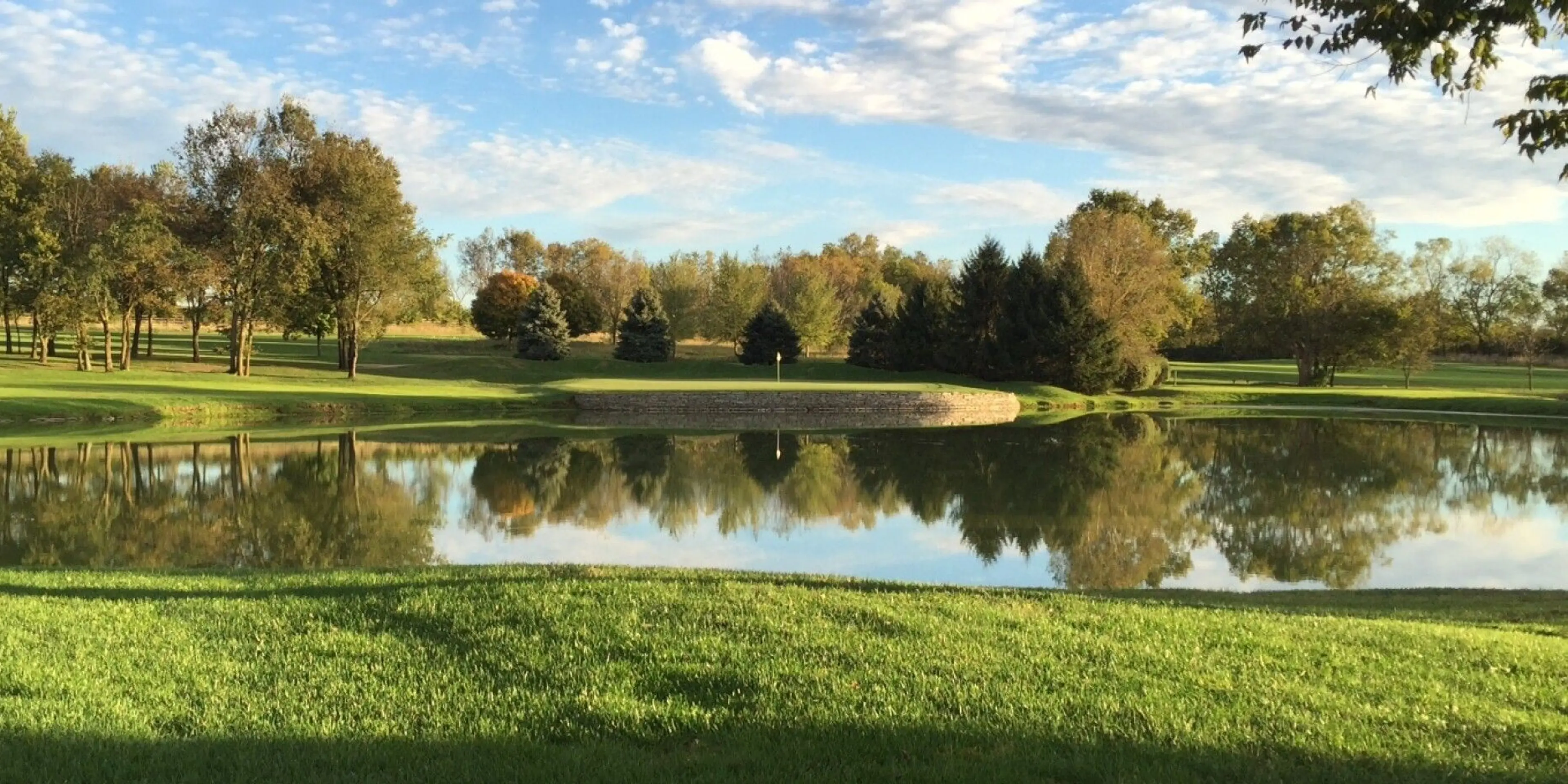 Landscape putting greens and fairway photo of the University Club of Kentucky golf course