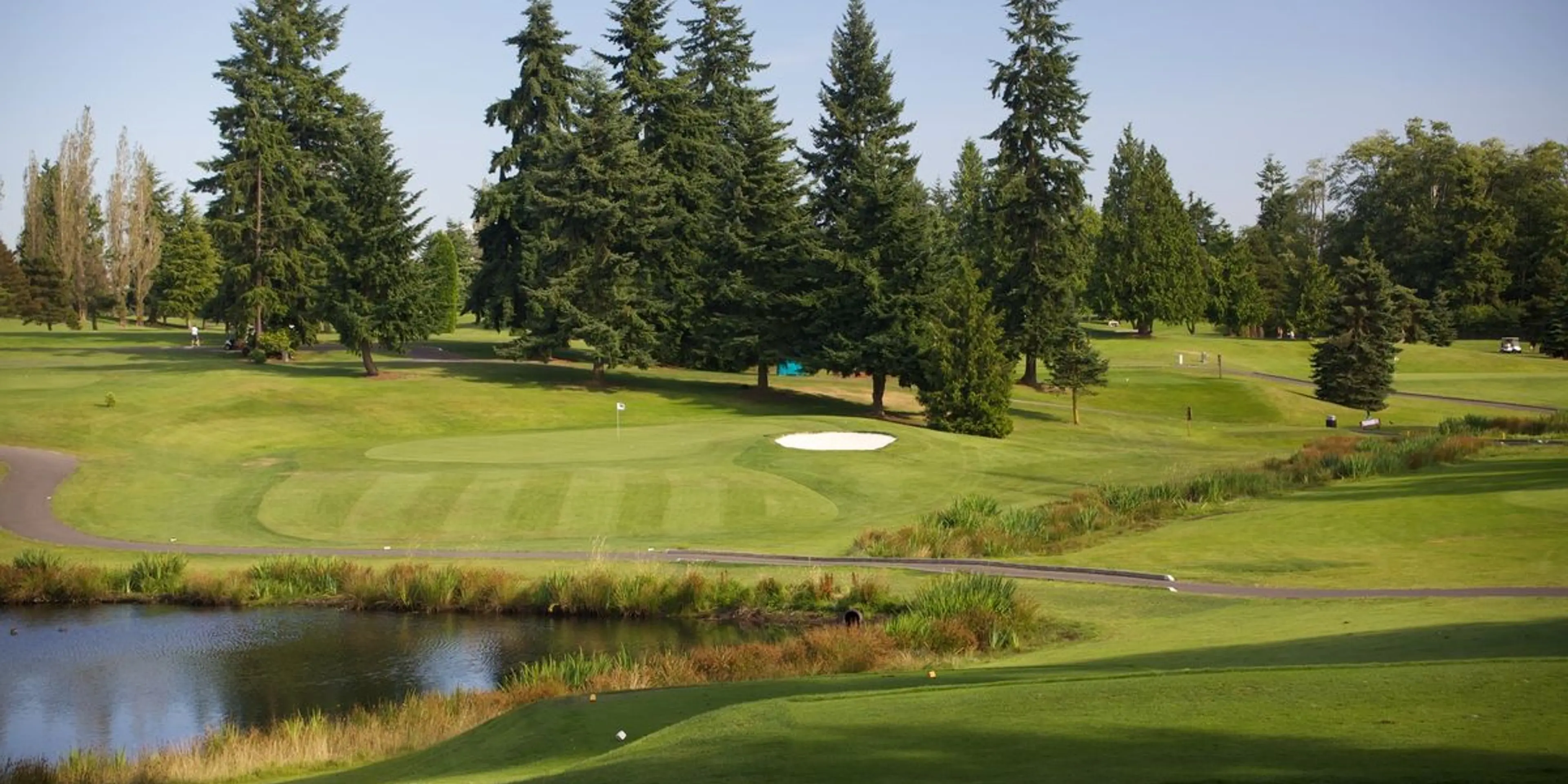 Landscape putting greens and fairway photo of the Walter Hall Golf Course golf course