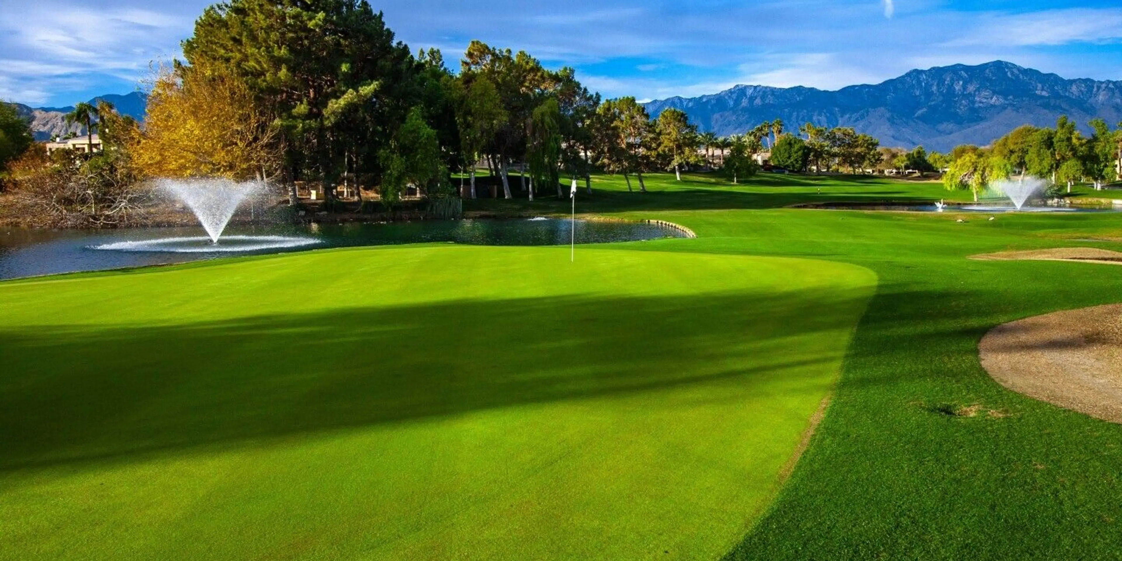 Landscape putting greens and fairway photo of the Westin Rancho Mirage Golf Resort & Spa golf course