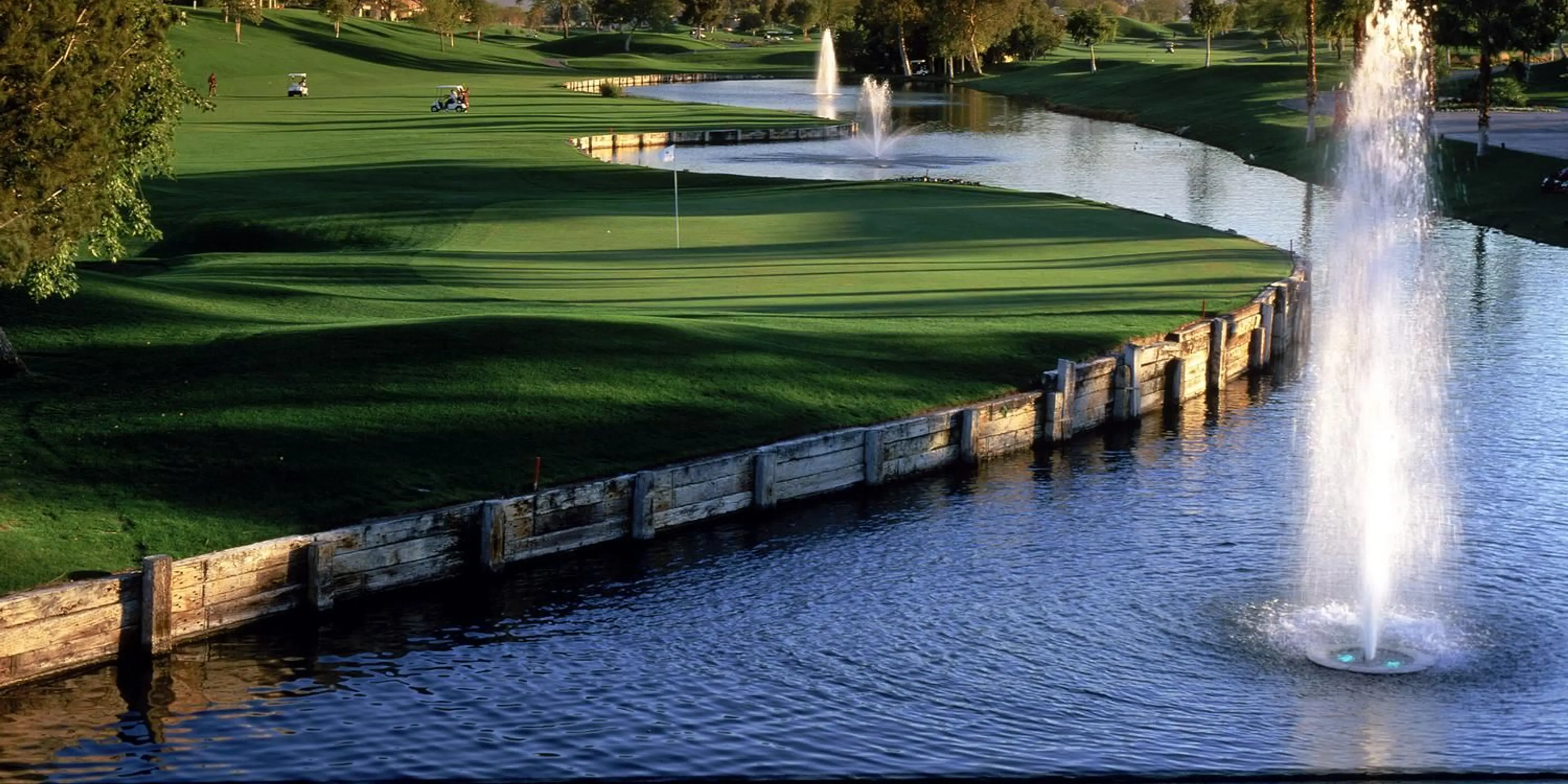 Landscape putting greens and fairway photo of the Westin Rancho Mirage Golf Resort & Spa golf course